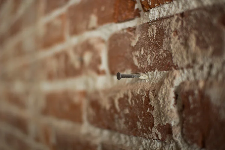The 1924-era brick wall that was revealed