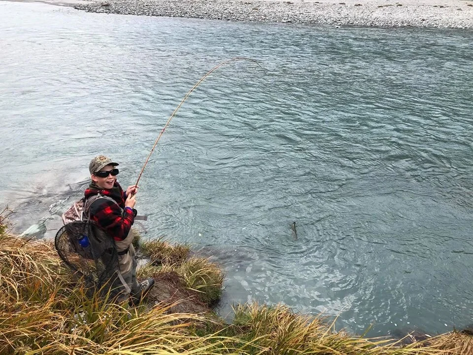 Louie’s smile says it all !  A large brown rose out of the deep water in this run and smashed his big streamer just under the surface catching us both by surprise.