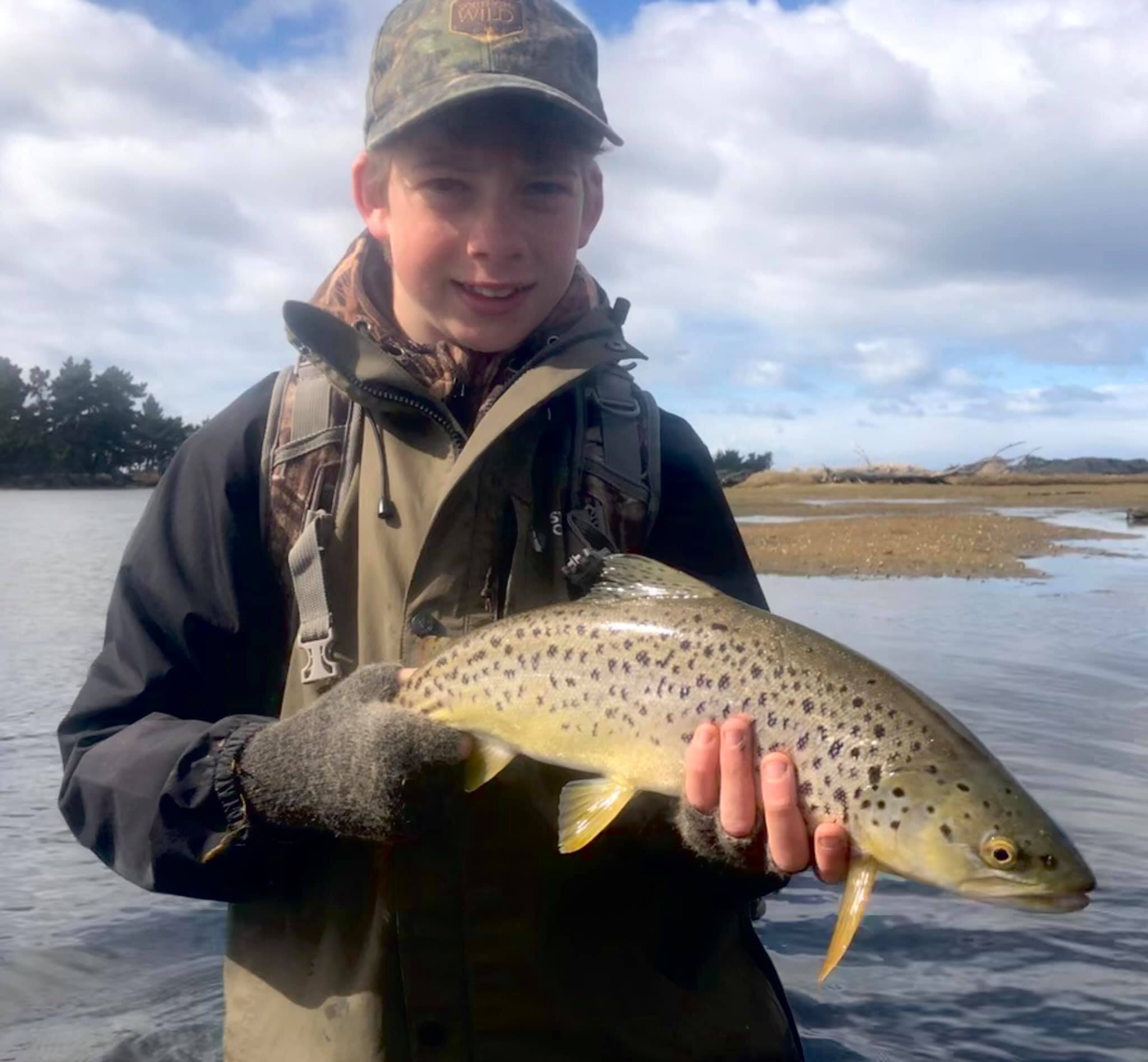 Louie with the first fish of the day.