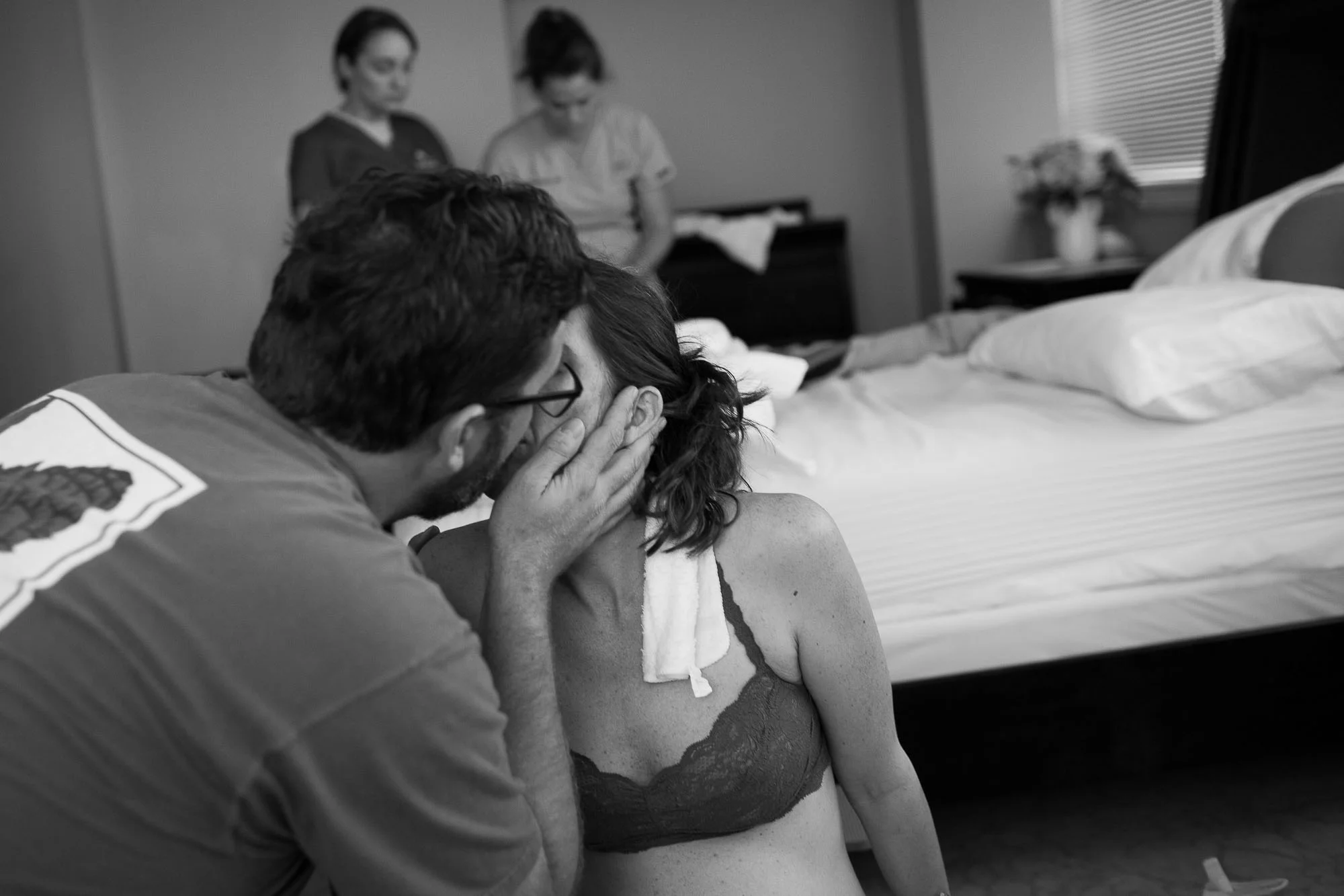 a kiss of encouragement--Austin birth photographer