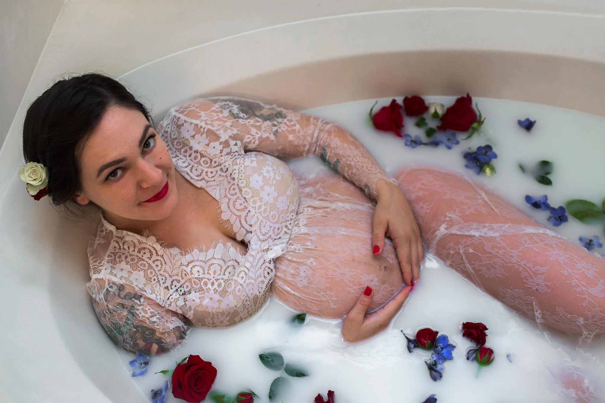 Milk Bath with roses. Austin maternity photographer. Milk bath maternity shoot.