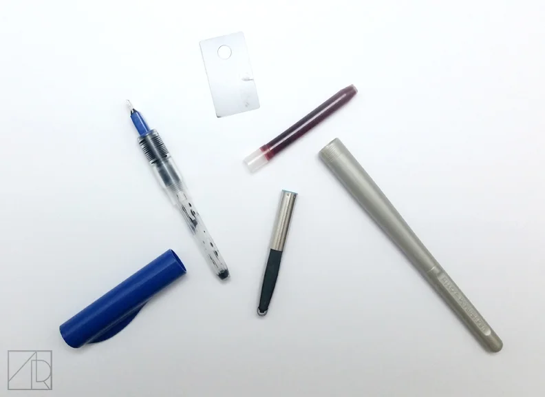In the box: pen, cartridges, and nib cleaner.