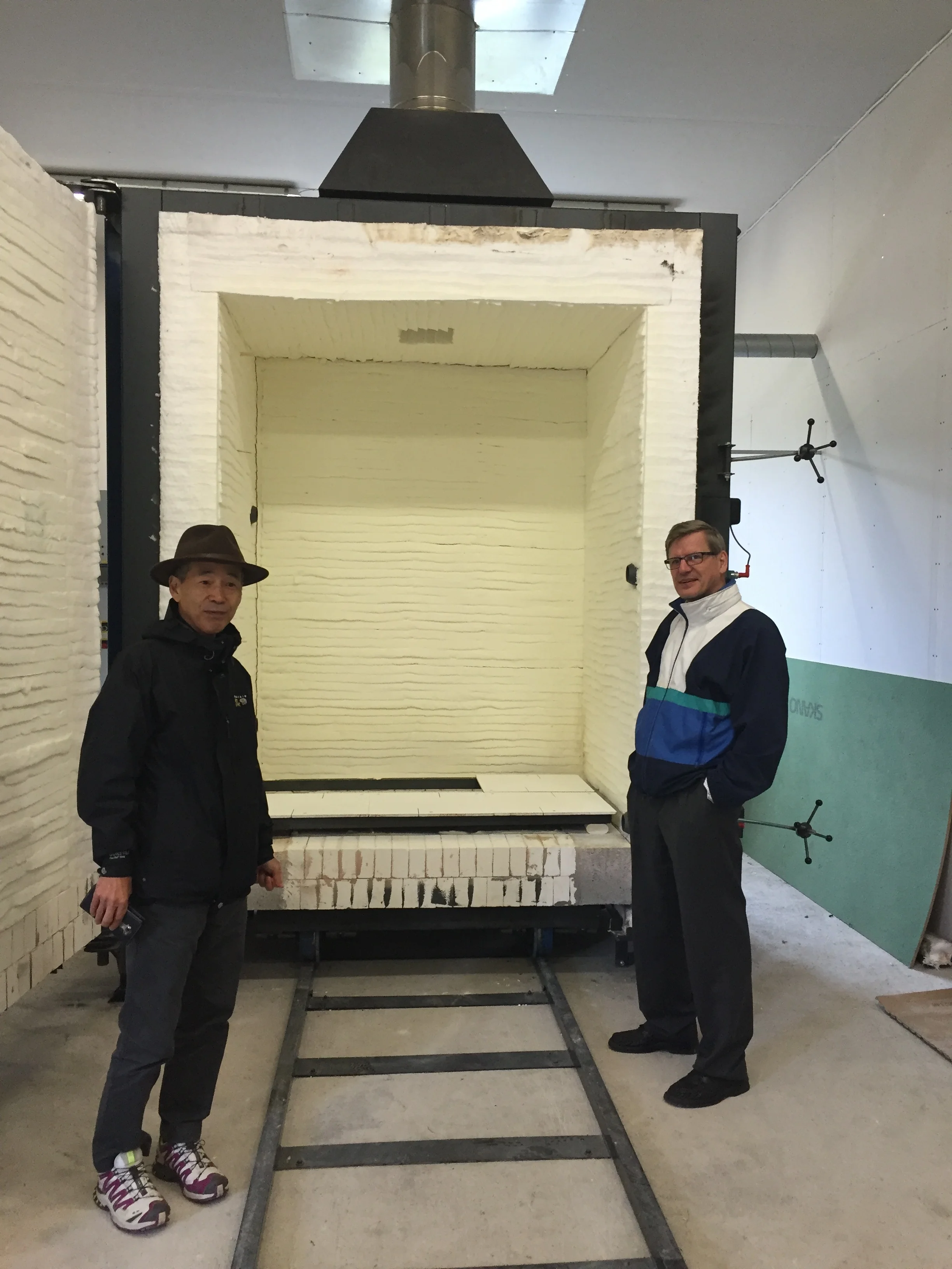 Suku Park and Reijo Lantto with the new kiln at the Arctic Ceramic centre