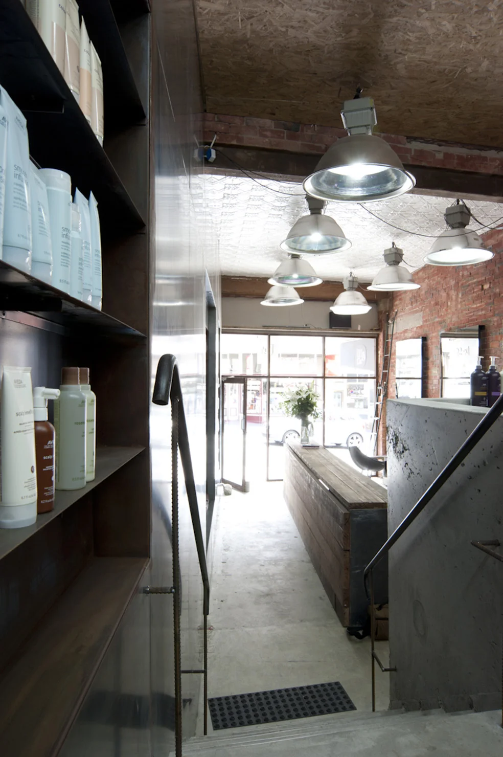 De Stijl Signage_Commercial Interior Architecture by FORMplay Architects_Off Form COncrete In-Situ stair and wall feature.jpg