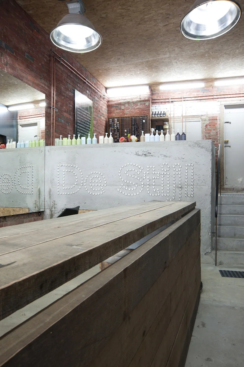 De Stijl Signage_Commercial Interior Architecture by FORMplay Architects_Off Form COncrete In-Situ stair and wall features.jpg