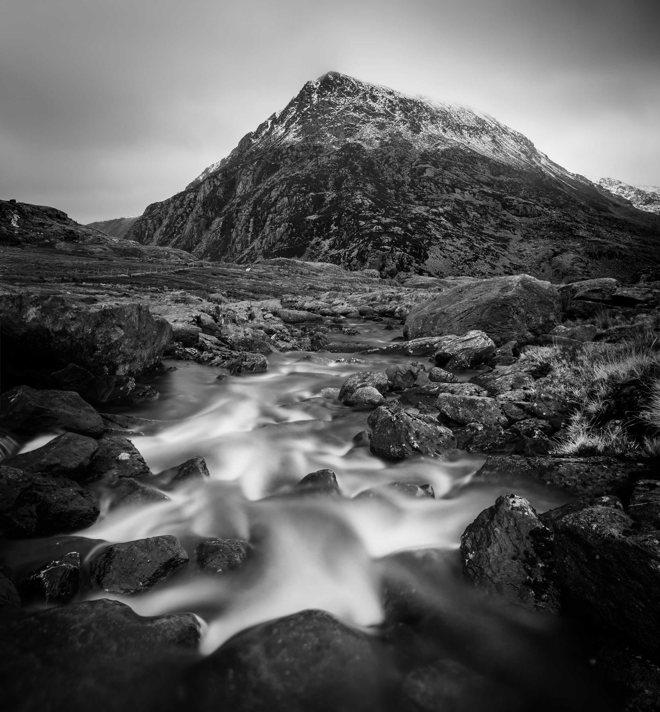 Vertical panorama of Pen yr Ole Wen from a stream. 28mm, ISO100, f/6.3, 25 seconds.