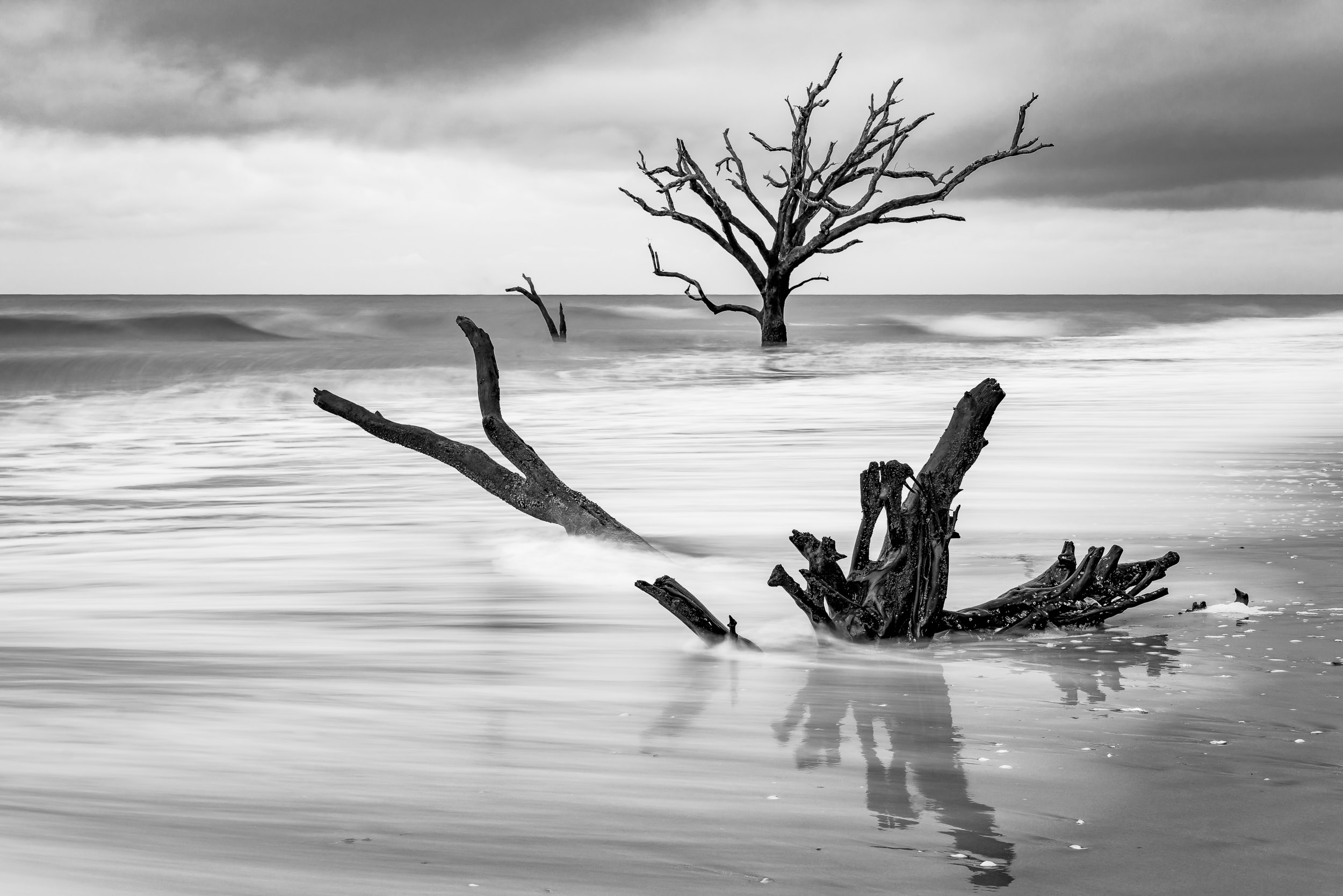 2 seconds to capture long lines as the wave retreats to the ocean at Botany Bay Plantation.