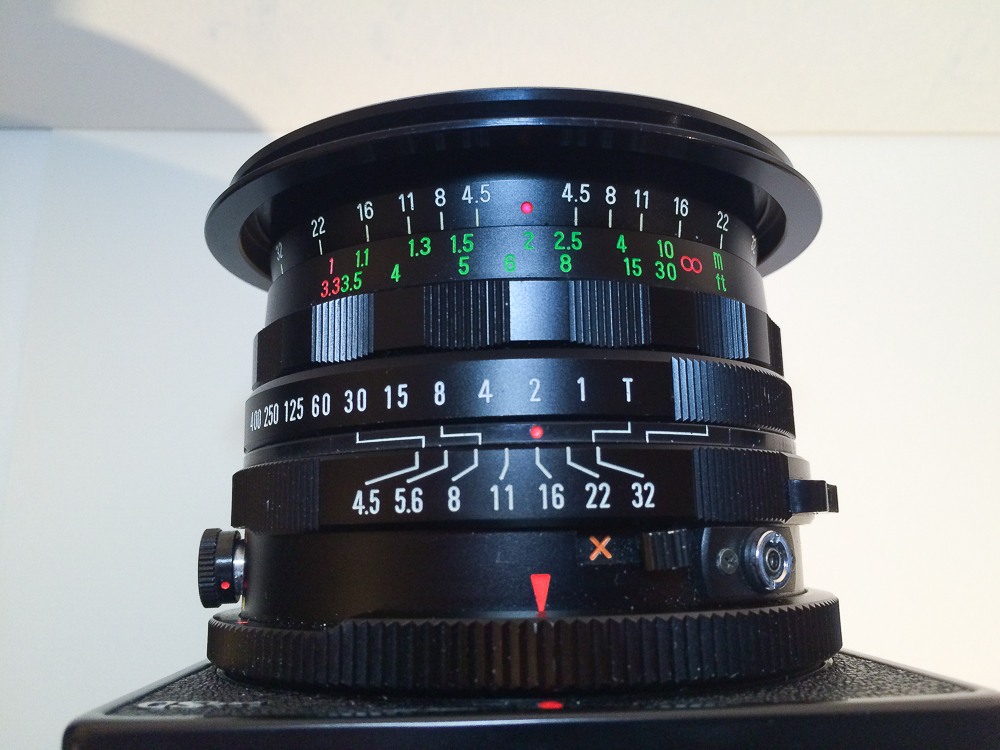 Here is Sekor C 50 set up with f 16 and if focused on 2 meters distance, everything from 1.1 meters to infinity will be in sharp focus. The ring with green numbers is adjusting the floating elements!