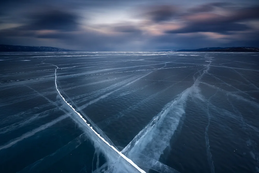 Caption: Walking on Glass, Camera: Nikon D810, Lens: Nikkor 16-35mm, Exposure: 164s, Aperture: f/16, ISO: 64, Filters: Lee Big Stopper & Lee Graduated ND 0.6, Photographed: Baikal Lake, Siberia, Russia, March 2016
