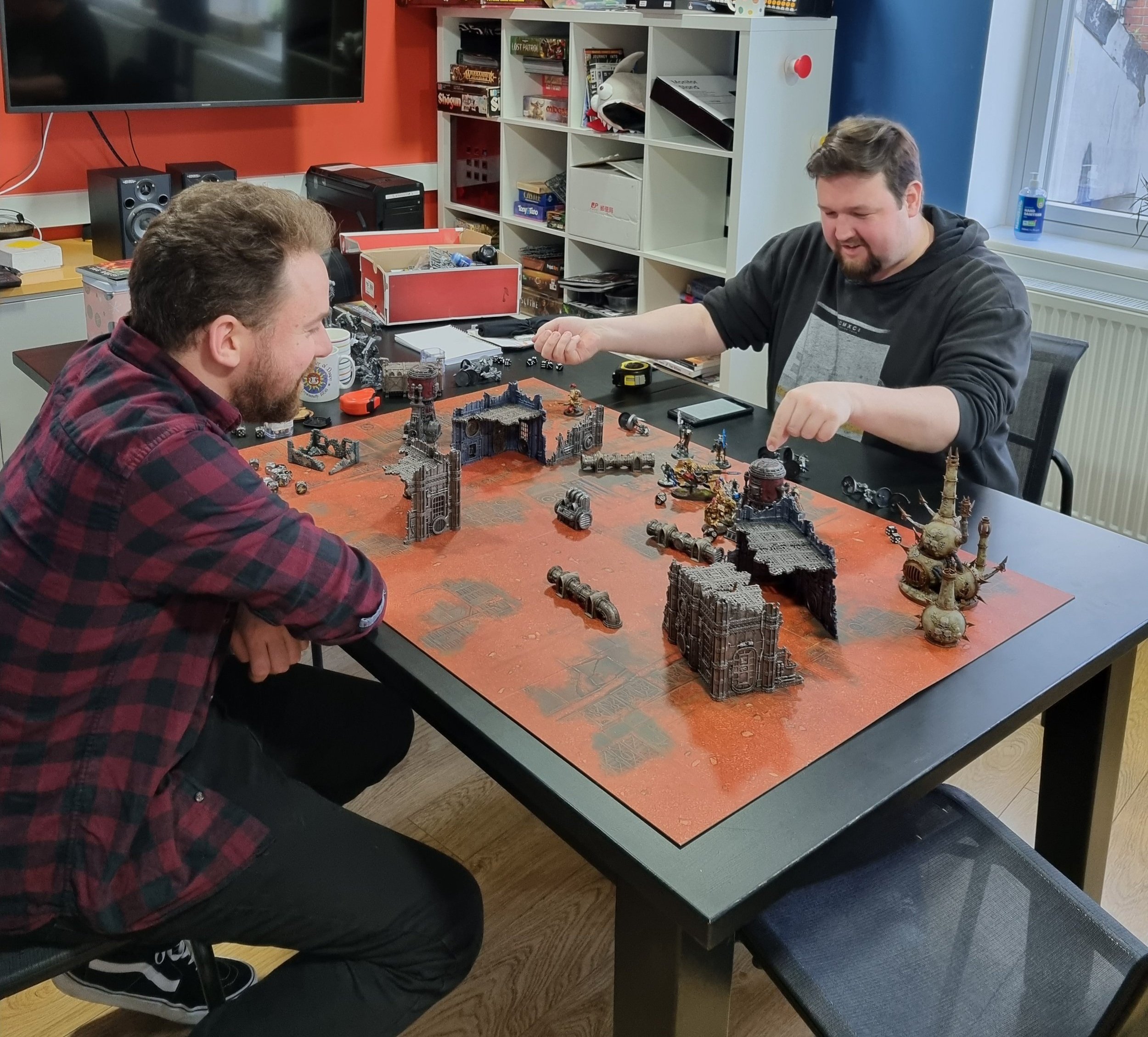 Boltgun lead designer and producer play Warhammer.jpg