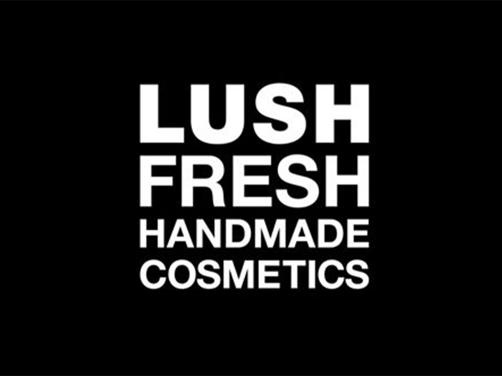 Schwarz-weißes Logo mit dem Text 'LUSH FRESH HANDMADE COSMETICS' in großen, fettgedruckten Buchstaben.