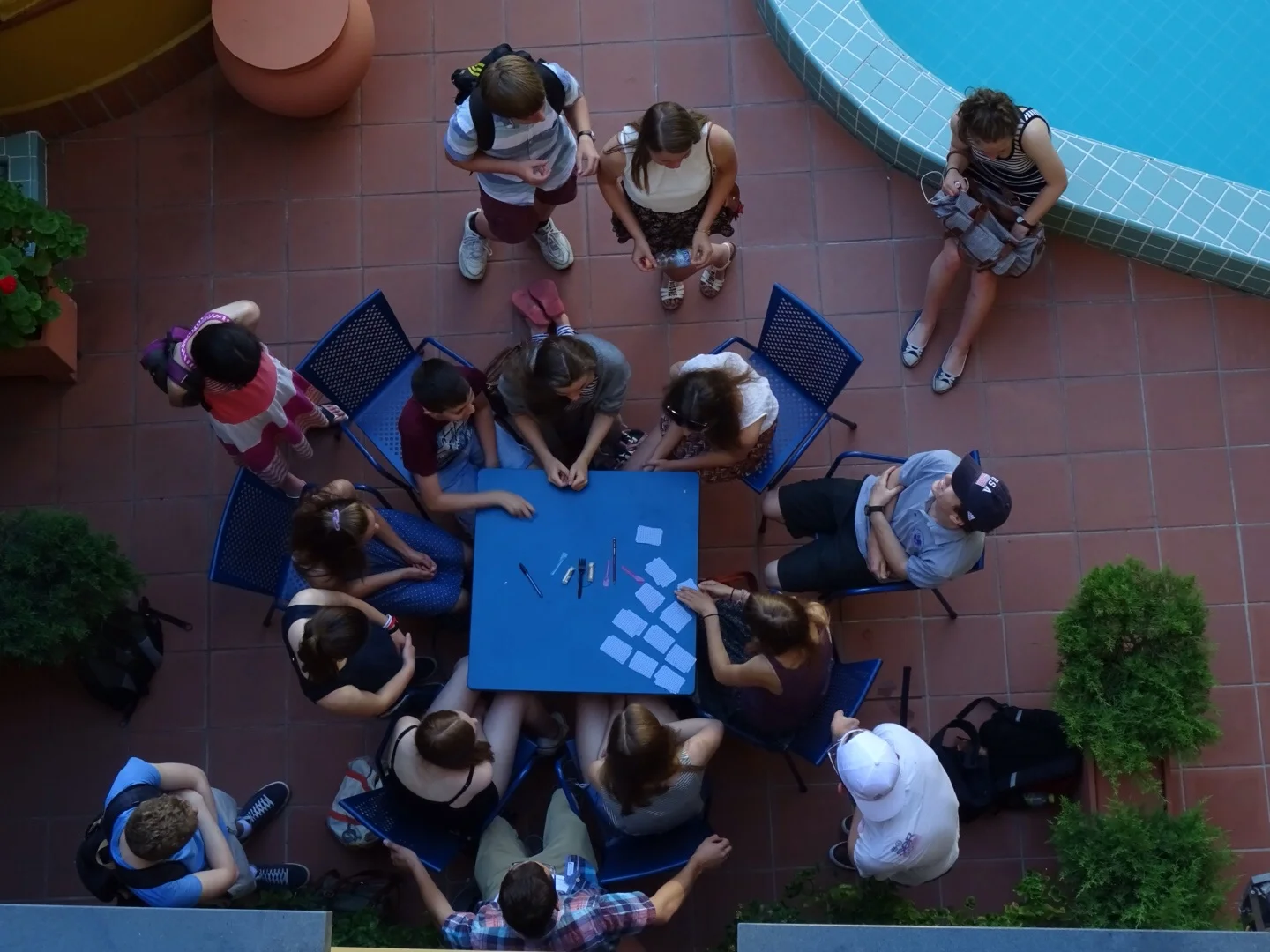 Cards by the pool before boarding the coach.