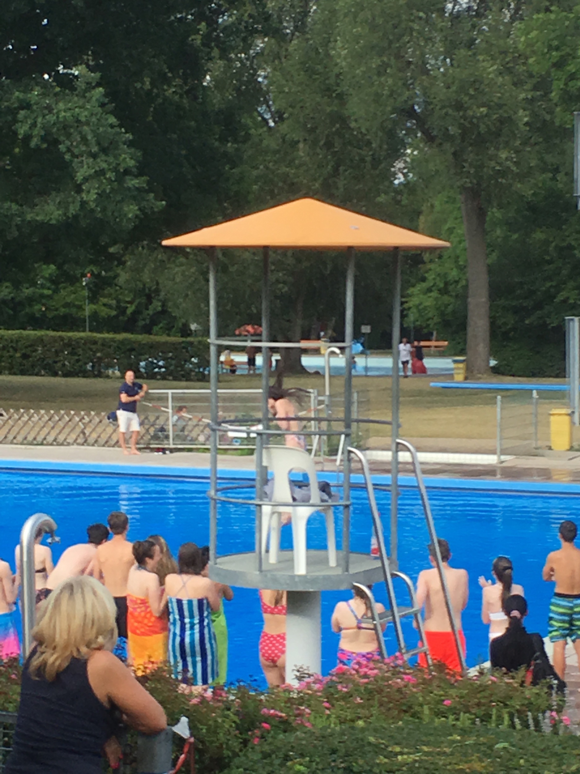 Sophie and Amy went up to the 1st diving level, and whilst deciding if they really wanted to dive in, the lifeguards locked the entry gate. After 20 minutes encouragement Sophie dived in followed swiftly by Amy. Final encouragement was from an older lifeguard who shouted up to them. “It’s ok you have plenty of time, the season doesn’t end for another 4 weeks!”. If you look closely you can just see Amy diving behind the. Lifeguard lookout position.