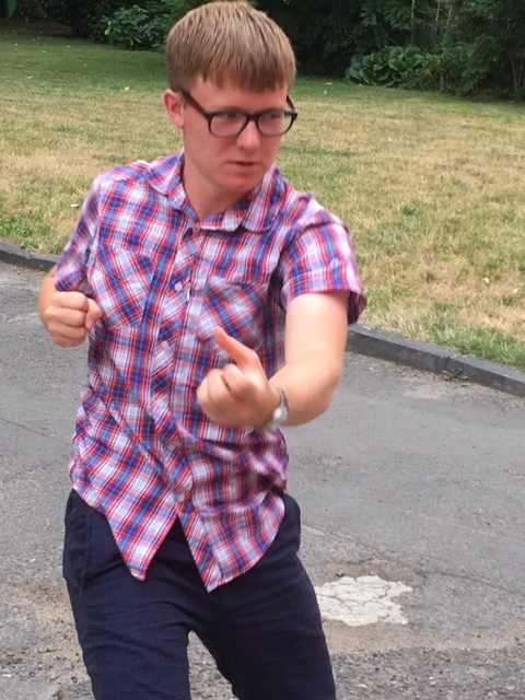 Punching with angry gaze to increase strength and control anger.