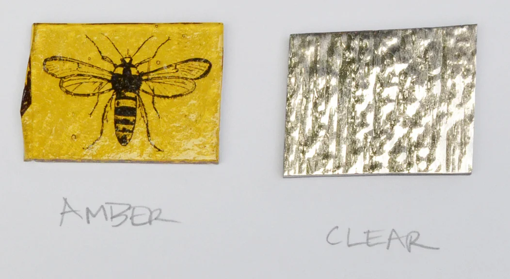 The black insect was pre-fired onto the amber glass and the platinum full coverage decal was pre-fired onto the clear glass. 