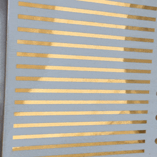 Peekaboo! See our reflection in that shiny 23K Gold?