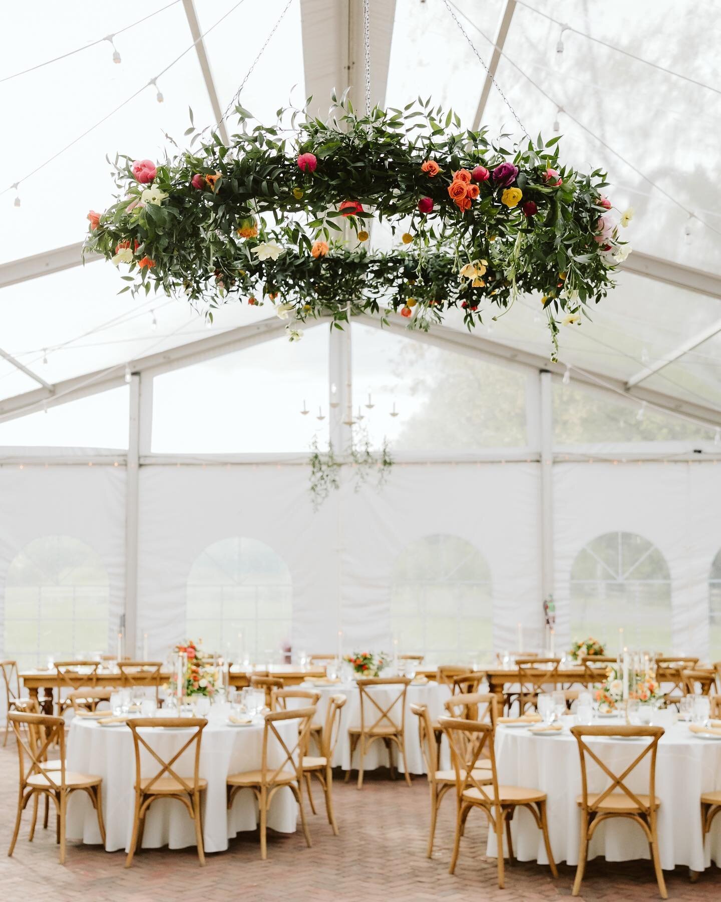 Lots of greenery and bright florals, and the beautiful clear top tent at @fernbrook.farms 🌿