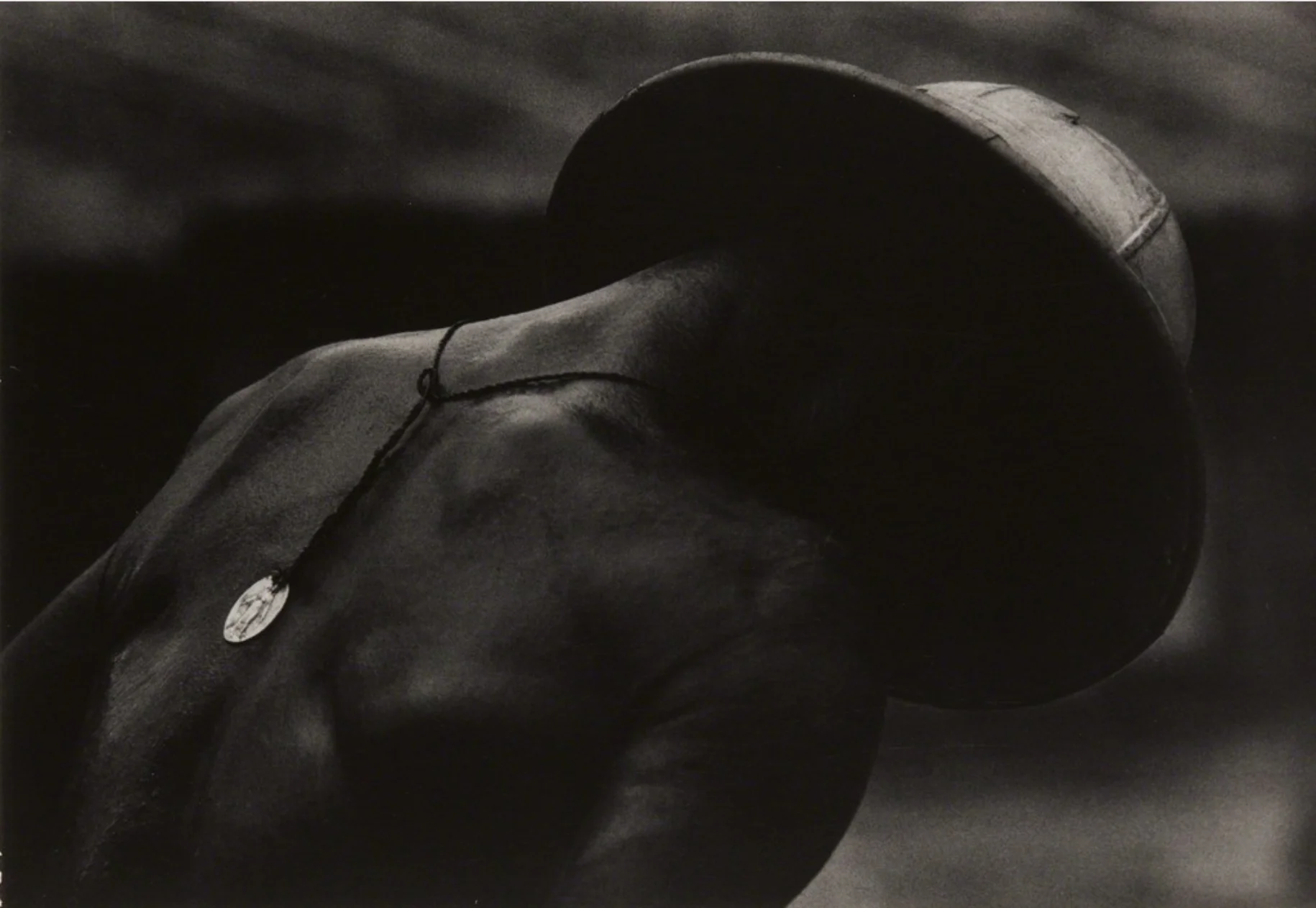  © W. Eugene Smith Leper Patient and Religious Medal from "A Man of Mercy, reprinted from the exhibition catalogue. 