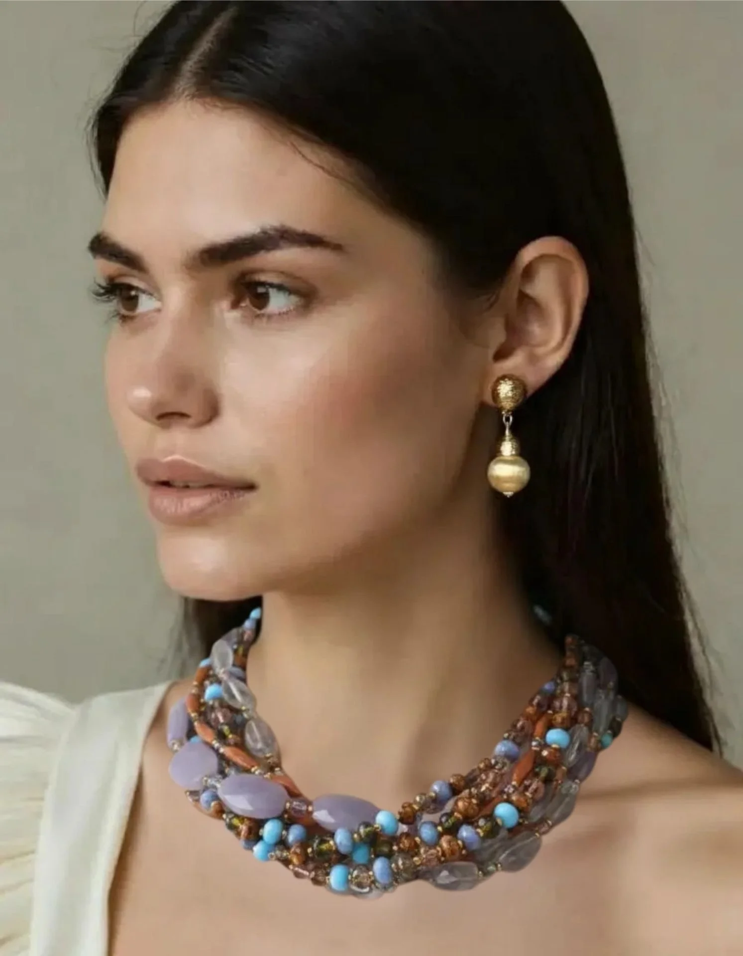 lilacturq. quartz twist neck on gold clip ear on model.jpg