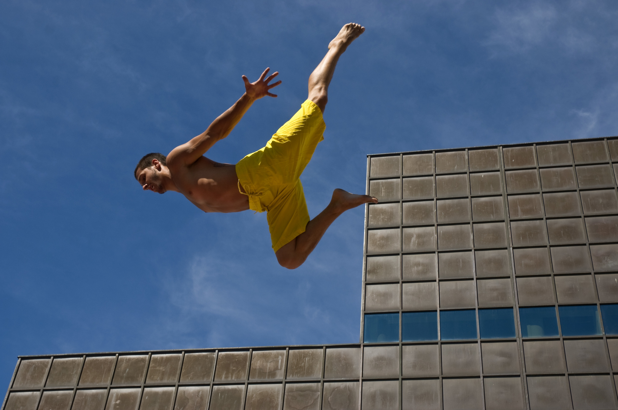  An aerial performer practices on a trampoline before the start of the Francofolies, a huge street celebration of French Canadian culture in Montreal, Quebec. 