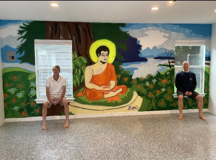 Rock under a tree along the middle path 