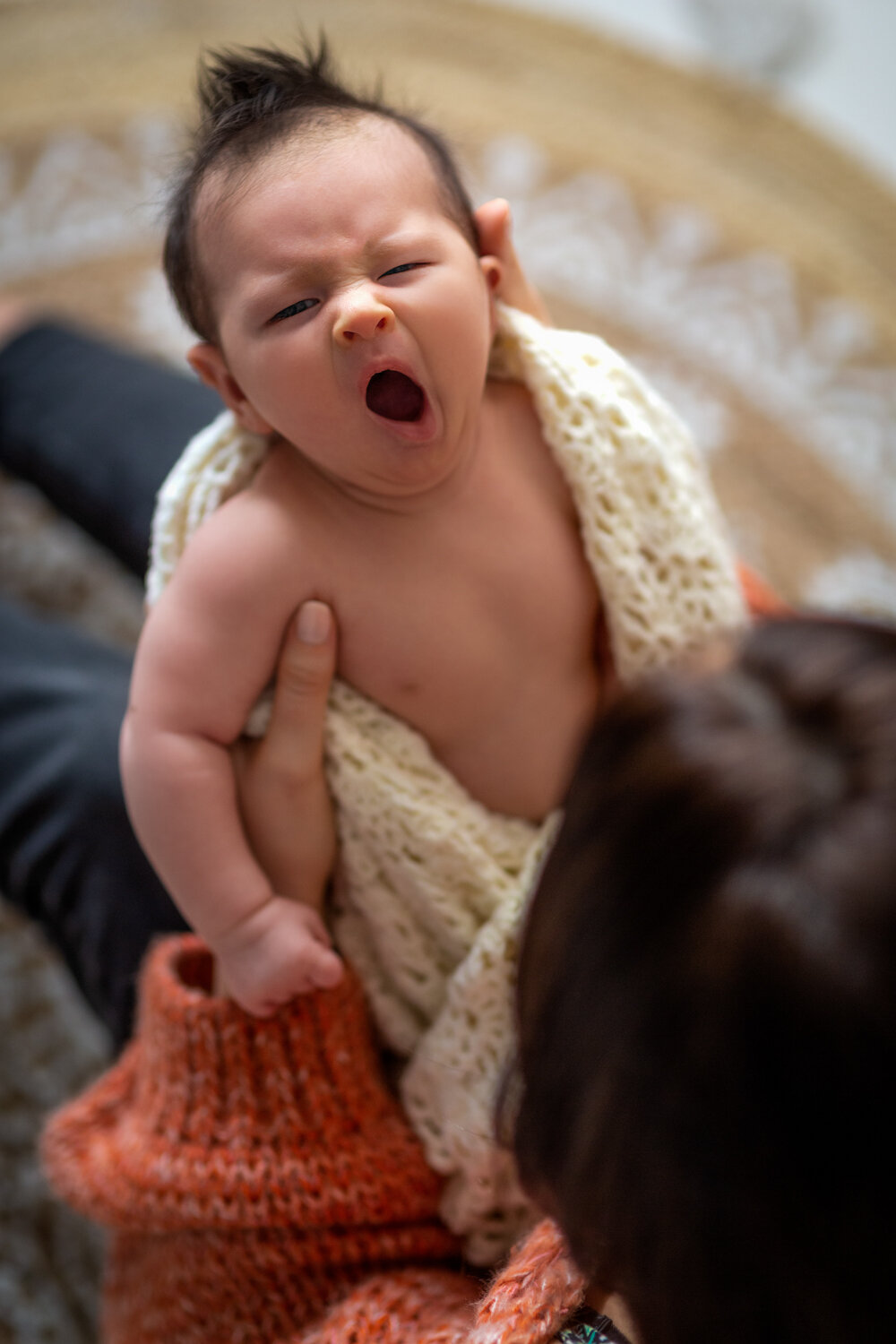 reading baby photographer berkshire new baby yawning