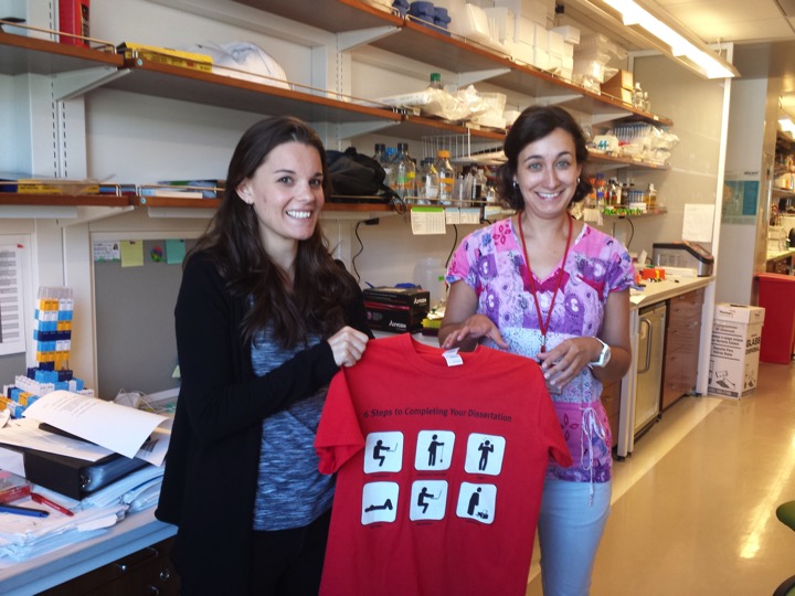  The traditional passing of the dissertation T-shirt as Gwen graduates!  (left to right) Gwen Buel, Joana Nunes  September 2016 