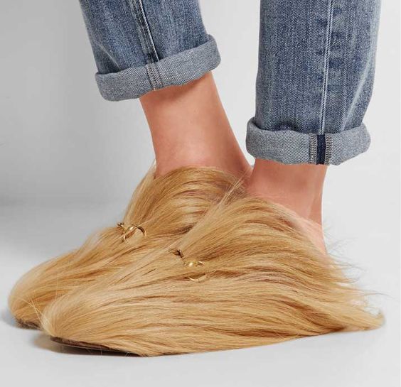 Do these fluffy slippers remind you of anyone? Image via pinterest. 