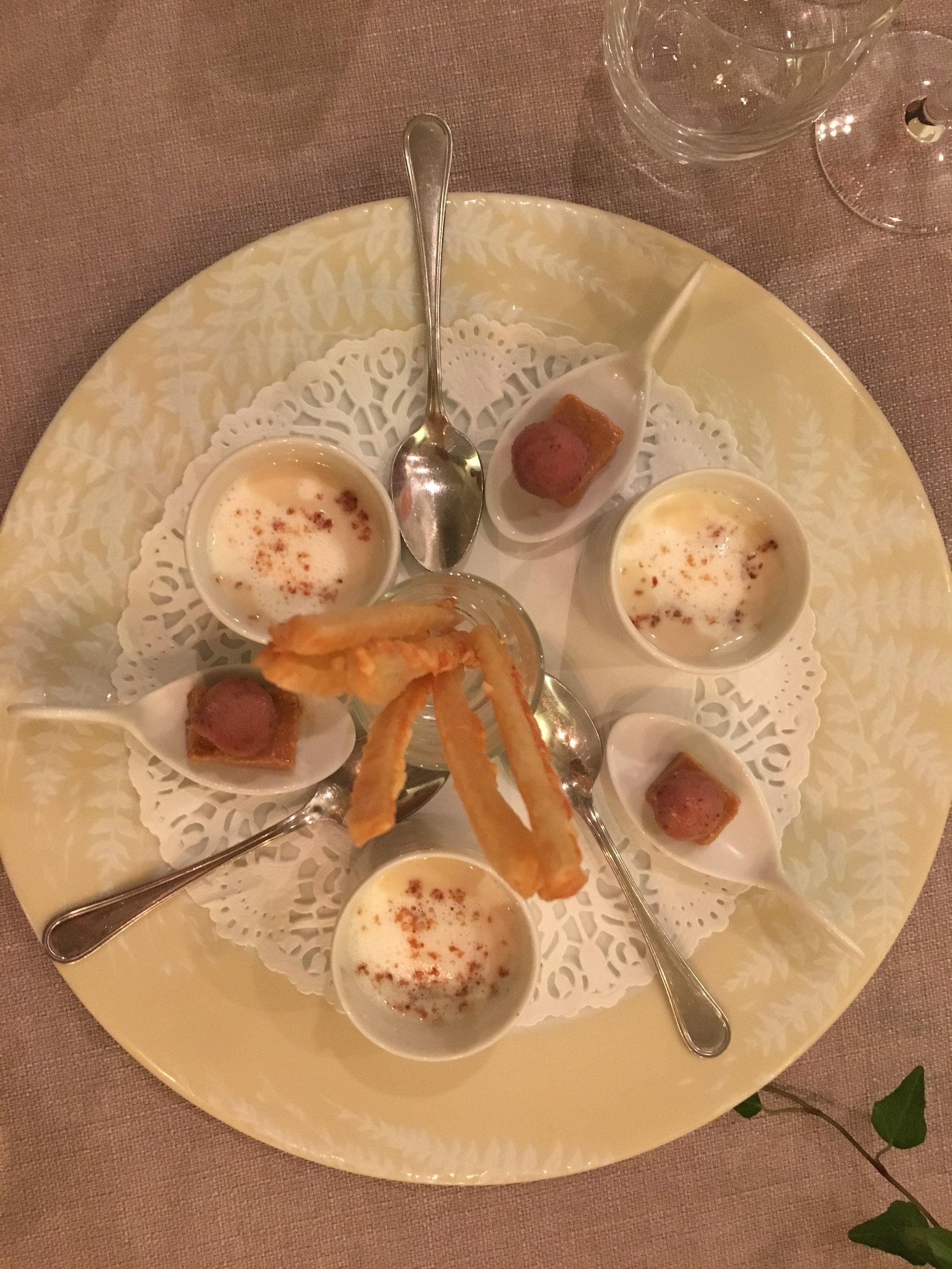 A shot each of cauliflower soup with a side of fig sorbet, caramel fois gras and cheesy bread-sticks. 