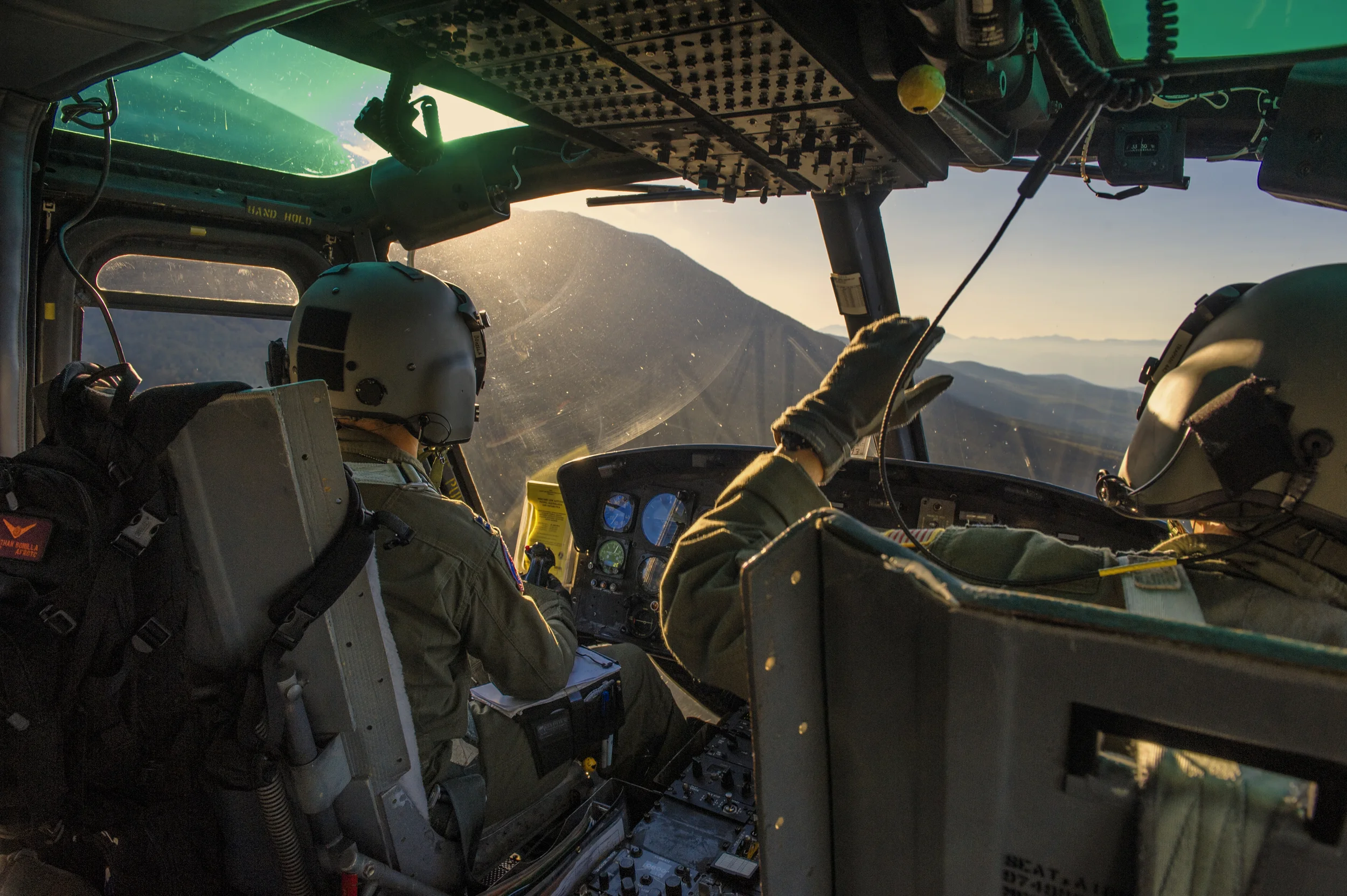 Capt. Jonathan Bonilla and Capt. Daniel Trapani, 459th Airlift Squadron pilots, operate a UH-1N Huey above the Combined Arms Training Center Camp Fuji, Japan, Oct. 13, 2015. Airmen from the 459 AS regularly practice their airlift capabilities in order to respond to regional contingencies. (U.S. Air Force photo by Airman 1st Class Delano Scott/Released)