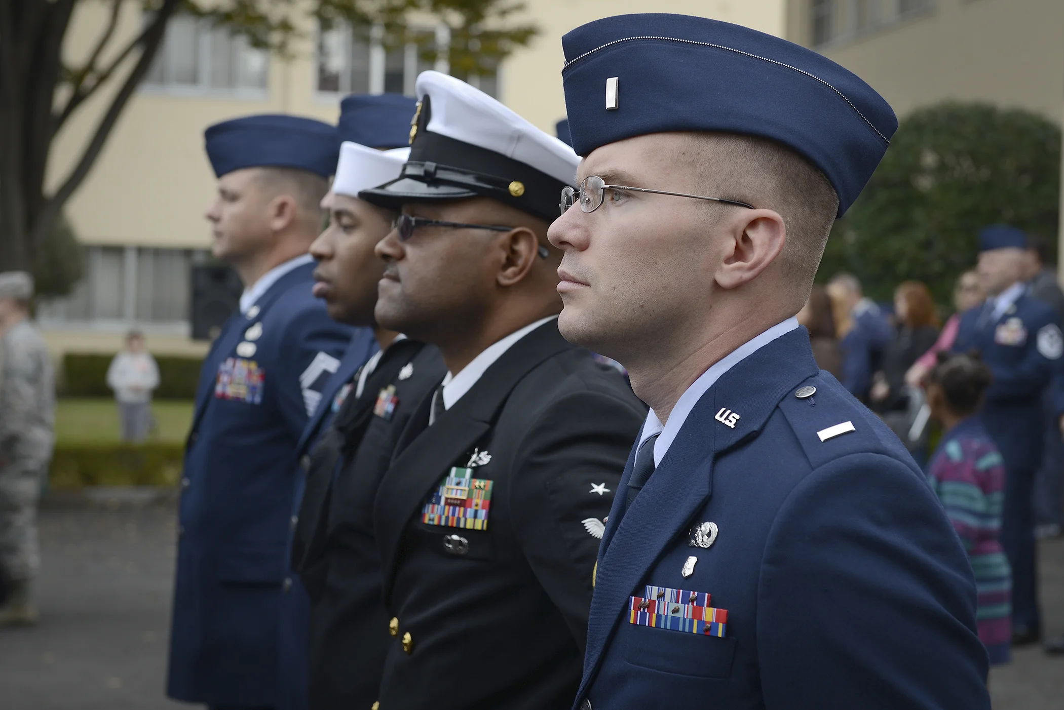 Service members stand in formation during a Veterans Day ceremony at Yokota Air Base, Japan, Nov. 11, 2015. Veterans Day celebrates the service of all U.S. military veterans and coincides with Armistice Day and Remembrance Day which are celebrated in other countries, marking the anniversary of the end of World War I. (U.S. Air Force photo by Senior Airman David C. Danford/Released)