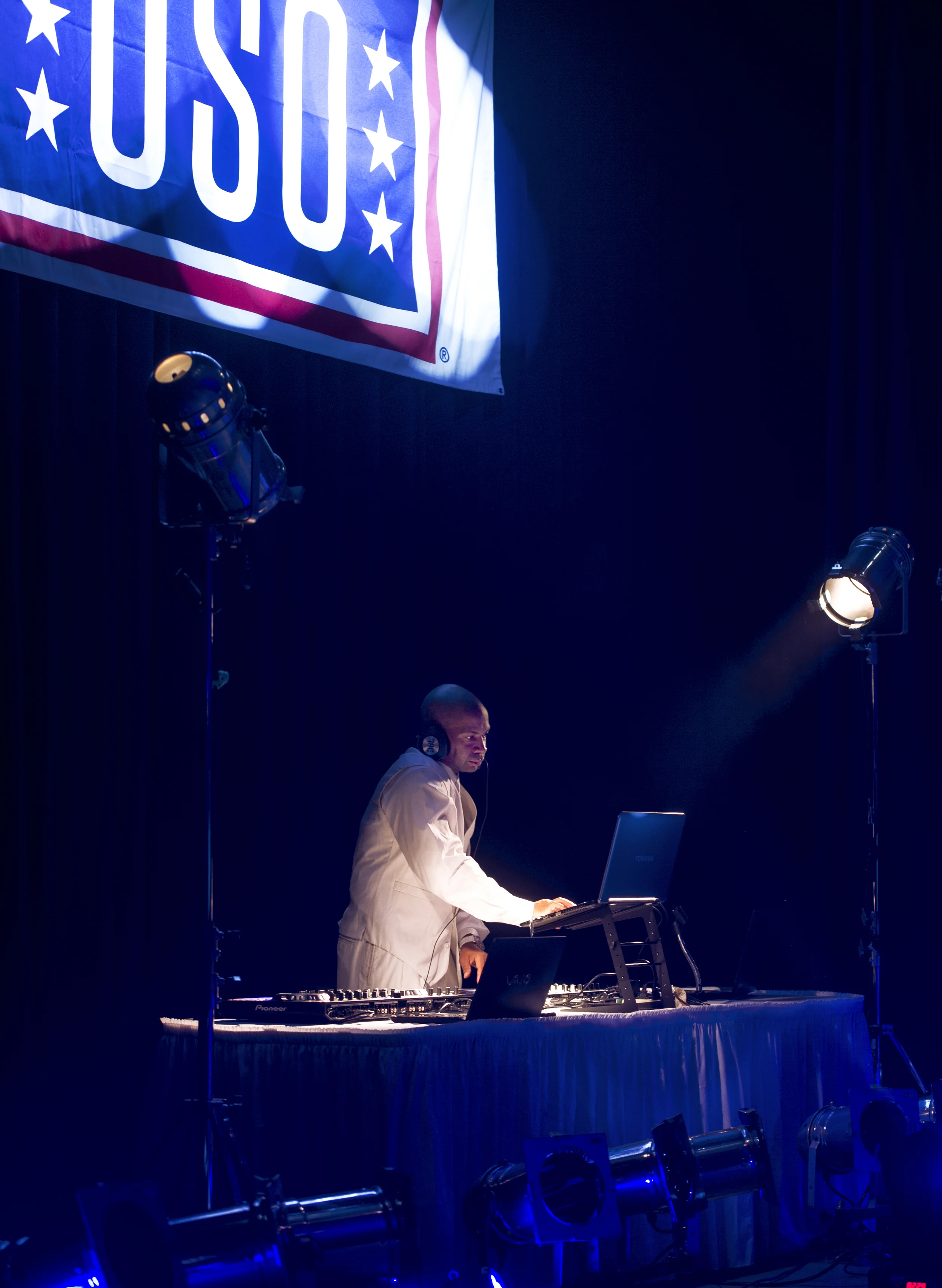 A performer with the United Service Organizations Empire tour plays music at Yokota Air Base, Japan, Dec. 15, 2015. In their visit to Yokota, the group participated in meet and greets, spoke with Yokota High School youth and hosted and performed a family-friendly White Party. (U.S. Air Force photo by Airman 1st Class Delano Scott/Released)