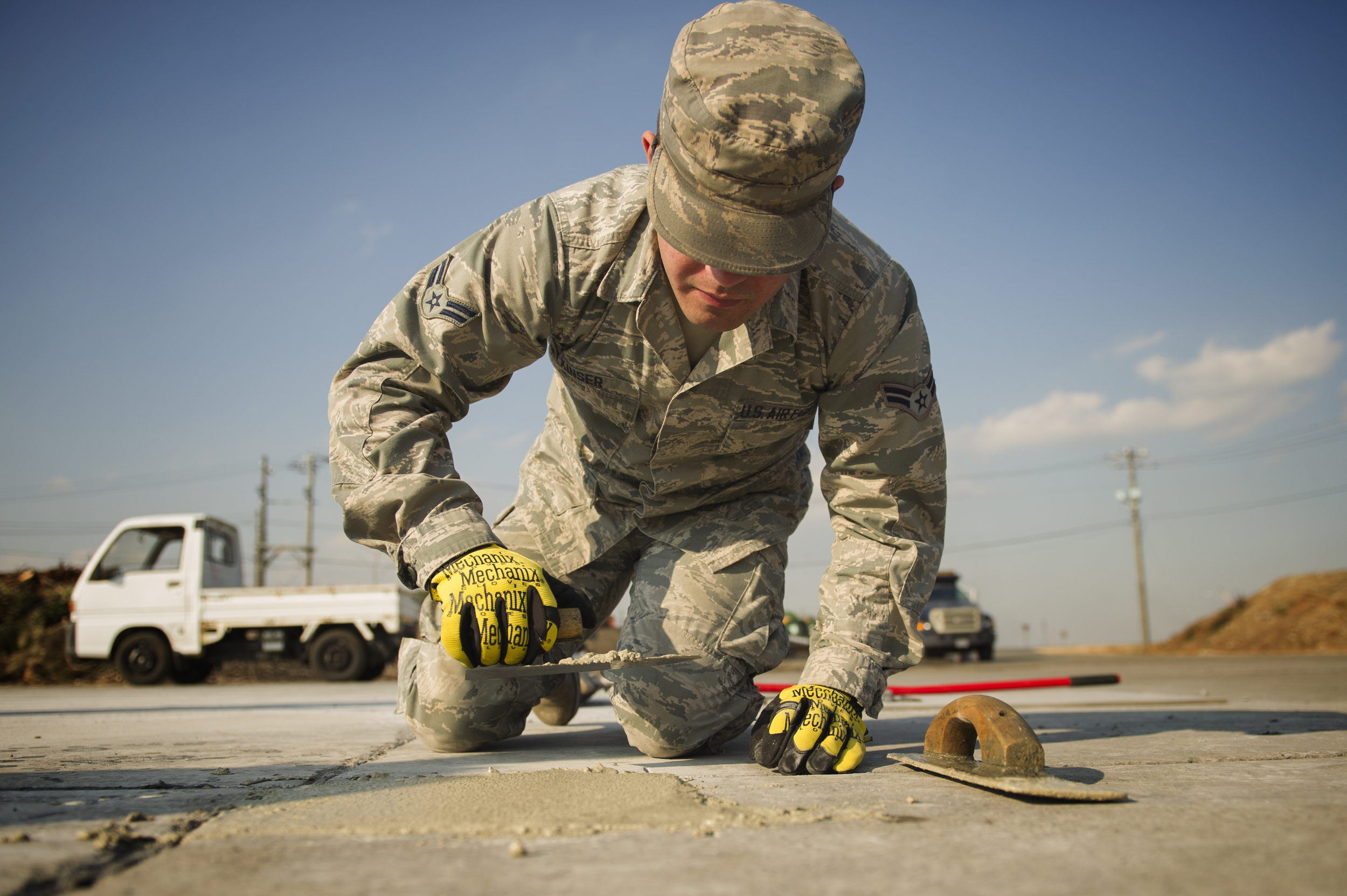 Airman 1st Class Brendan Kinser, 374th Civil Engineer Squadron pavements and equipment apprentice, performs a spall repair on a section of Yokota Air Base, Japan, Jan. 13, 2016. Aptly named ‘Dirt Boys’, 374 CES pavement and equipment Airmen perform spall repairs as part of their preventative maintenance practices to ensure Yoktoa’s airfield is free of cracks and tears. (U.S. Air Force photo by Airman 1st Class Delano Scott/Released) 