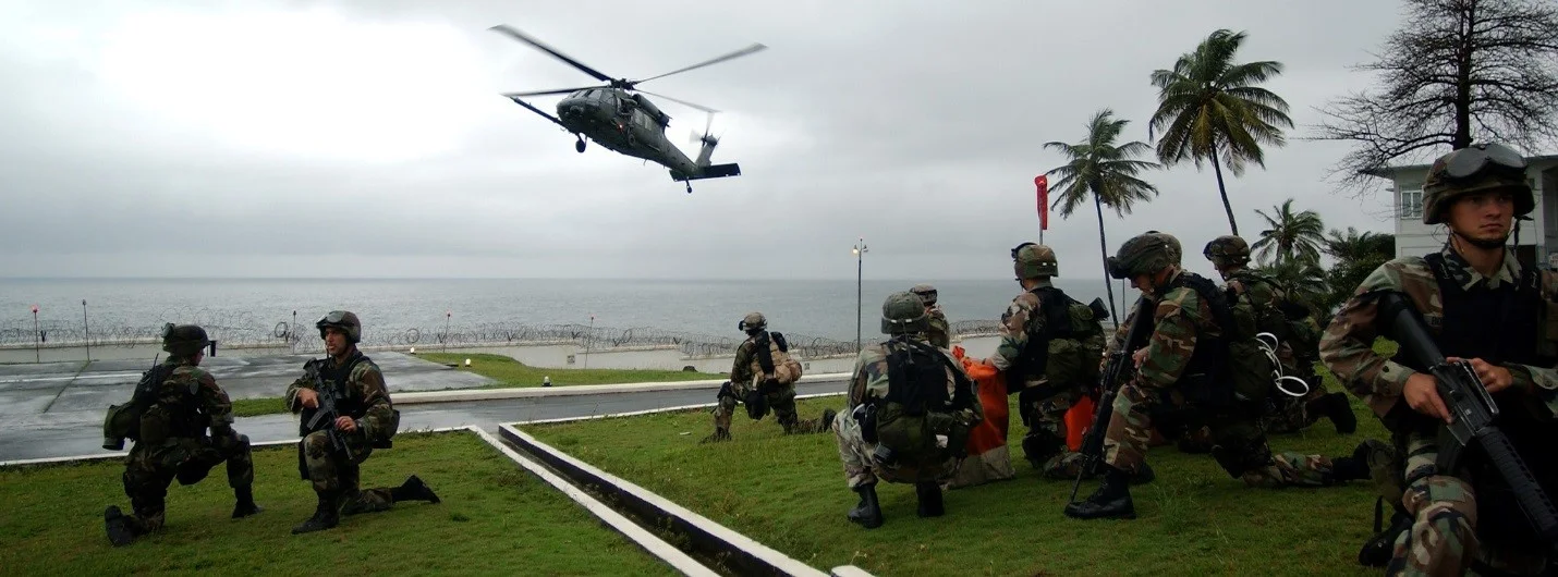 HH-60G arrives at US Embassy in Liberia to evacuate civilian personnel. The 398th Air Expeditionary Group was based out of Sierra Leone to provide personnel recovery and emergency evacuation capability for the humanitarian assistance survey team in Liberia. (U.S. Air Force photo/Tech. Sgt. Justin D. Pyle)
