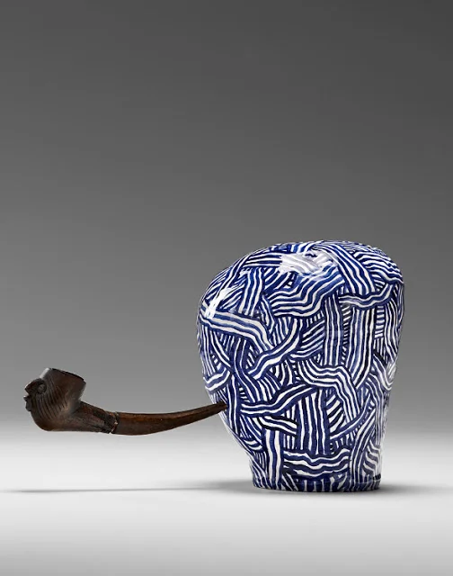 Laith McGregor, Woodsman , 2013, glazed ceramic + wood pipe 260 x 145 x 135 mm
