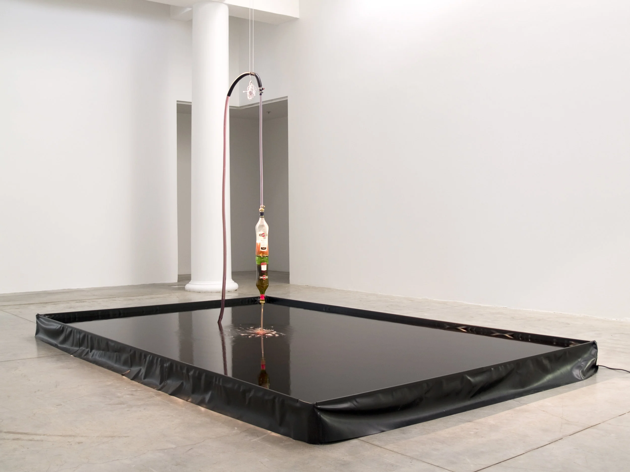Alicia Frankovich, Revolution (Martini Fountain) 2010, Martini Rosso, pool lining. tray, pump, piping, fixtures, silicon
