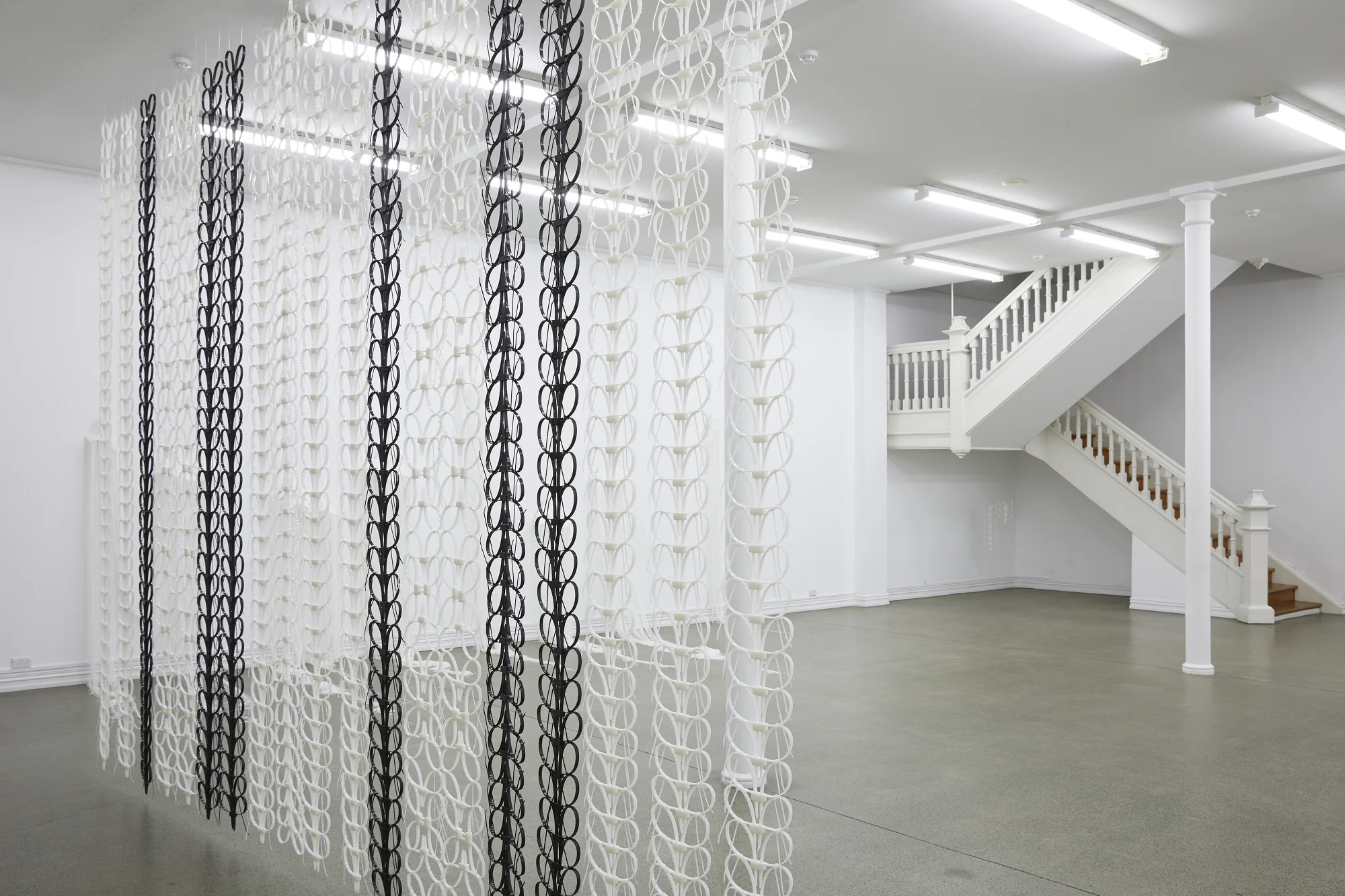 Yuk King Tan, Eternity Screen , 2019, cable tie, plastic handcuffs, zip ties