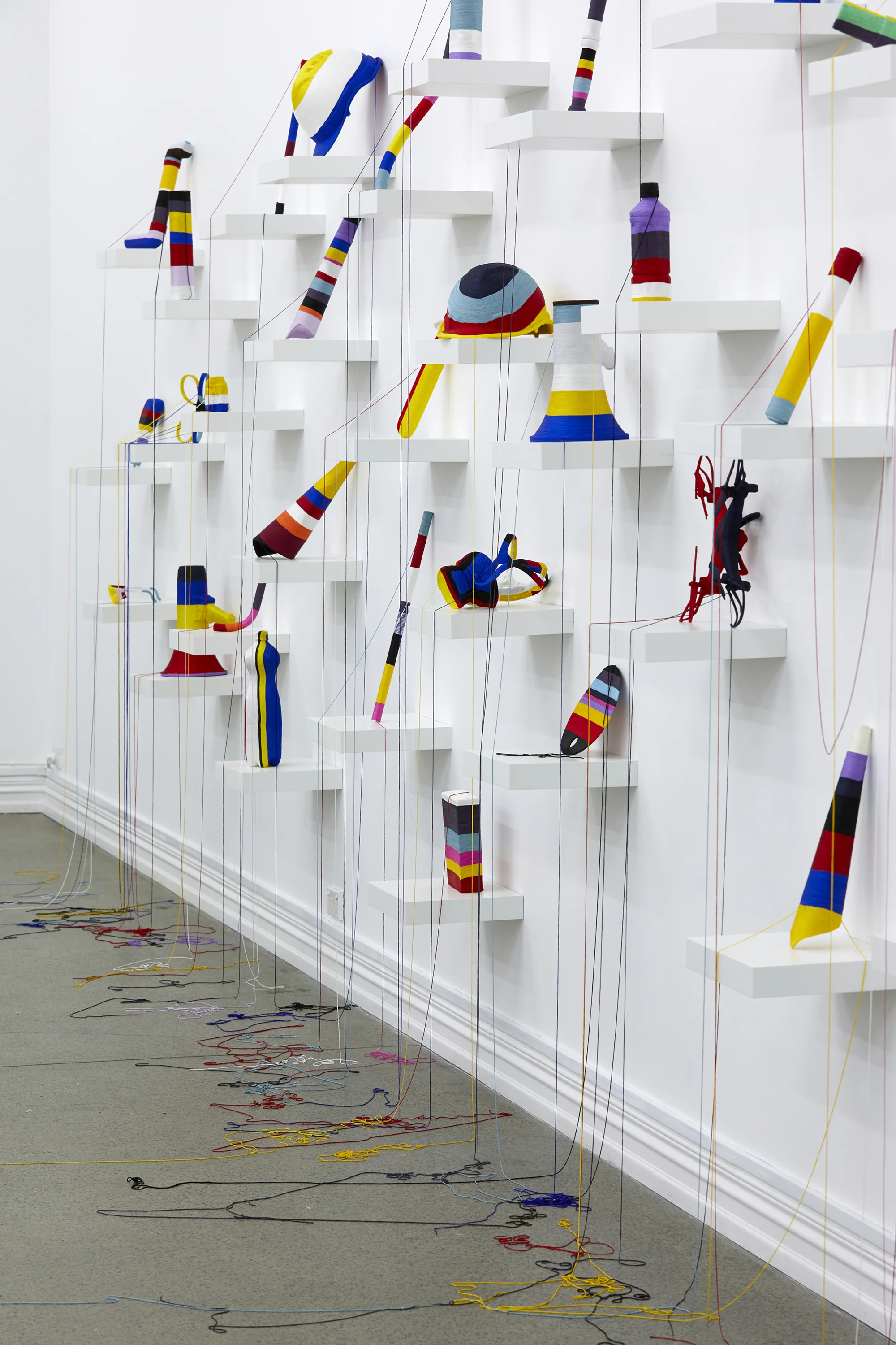 Yuk King Tan, Crisis Of The Ordinary (detail), 2019, string, collected protests objects from Hong Kong, Korea and New Zealand, dimensions variable
