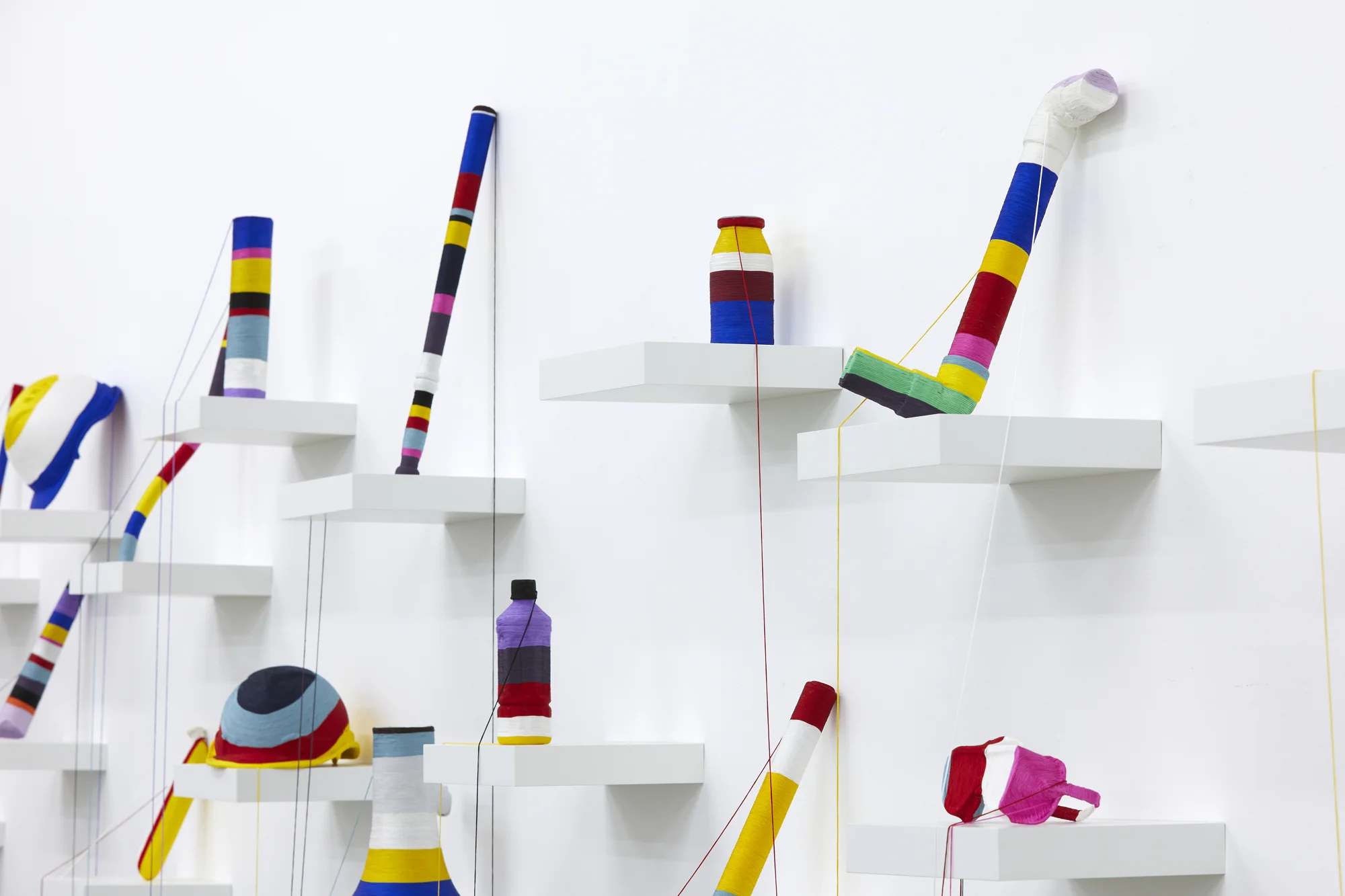 Yuk King Tan, Crisis Of The Ordinary (detail), 2019, string, collected protests objects from Hong Kong, Korea and New Zealand, dimensions variable