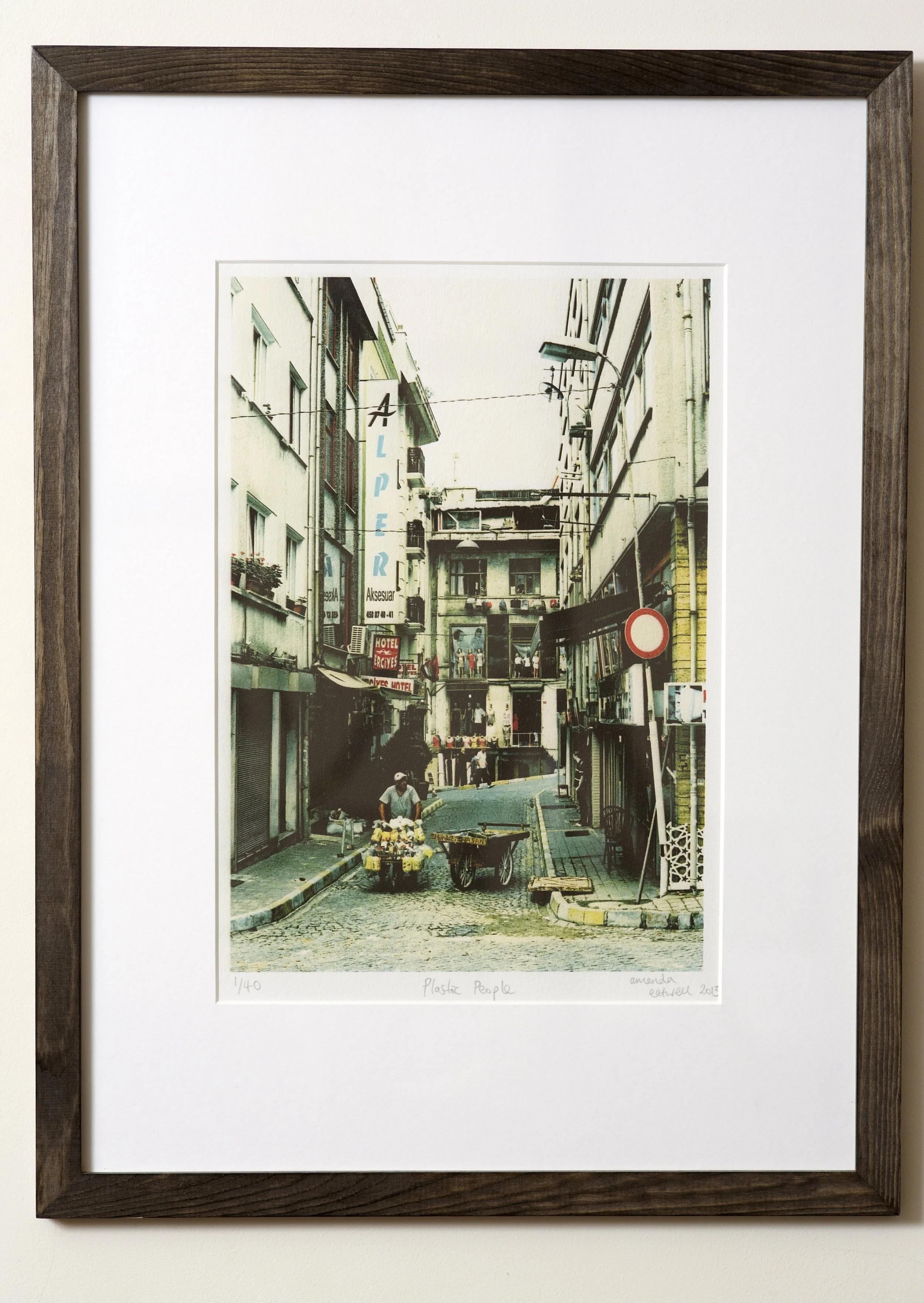 Plastic People Shot on a quick scoot around Istanbul on my last day in this great city. Little did I know my flight would be cancelled and I'd end up bored-stupid in an airport hotel room. One of my favourites! Cross-processed image on Hahnemuhle German Etching Paper. Frame Size approx 20 x 15" COST £40.00