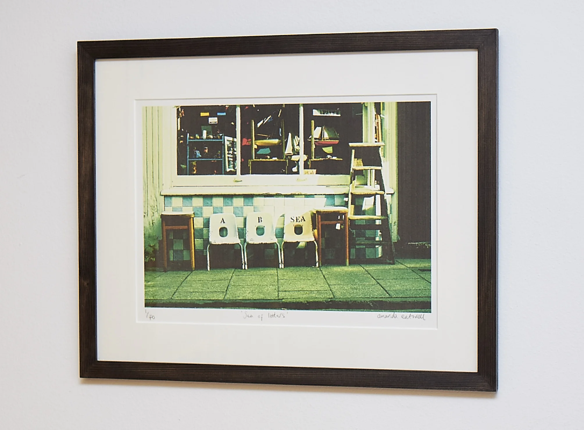 Sea Of Letters An evocative shot from Whitstable, and a great image for those who love a bit of Vintage! Cross-processed image on Hahnemuhle German Etching Paper. Frame Size approx 19 x 15" COST £40.00