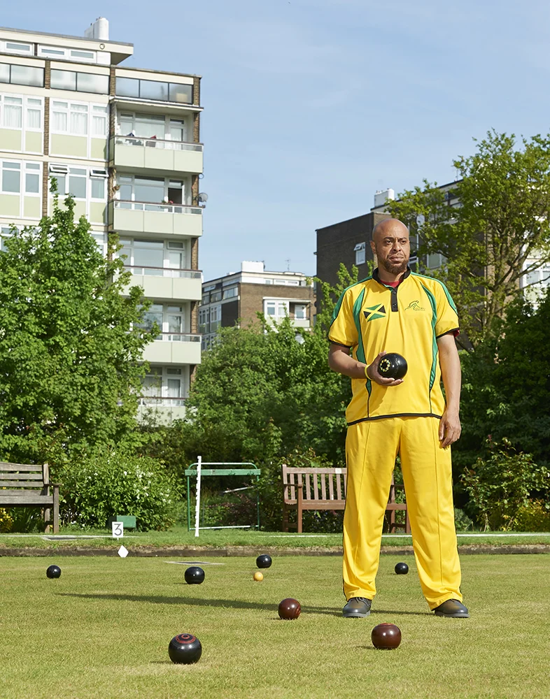 Man on a bowling green in south London, by photographer Amanda Eatwell