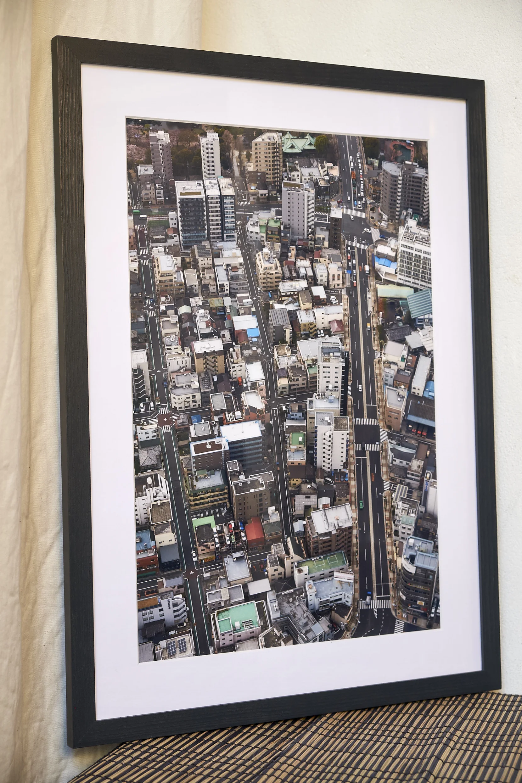 Seeing Green Taken from 300 metres high in Tokyo's Sky Tower, allowing unique views over the city. This is part of a series of six images which was recently exhibited with London Independent Photography. Frame Size approx. 23 x 17", painted in a dark, oily blue. COST £75.00