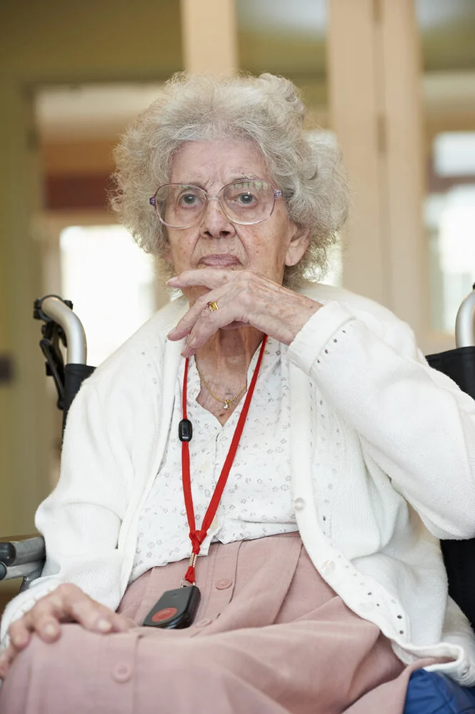 Photo of elderly lady in her wheelchair as part of a commission for MHA