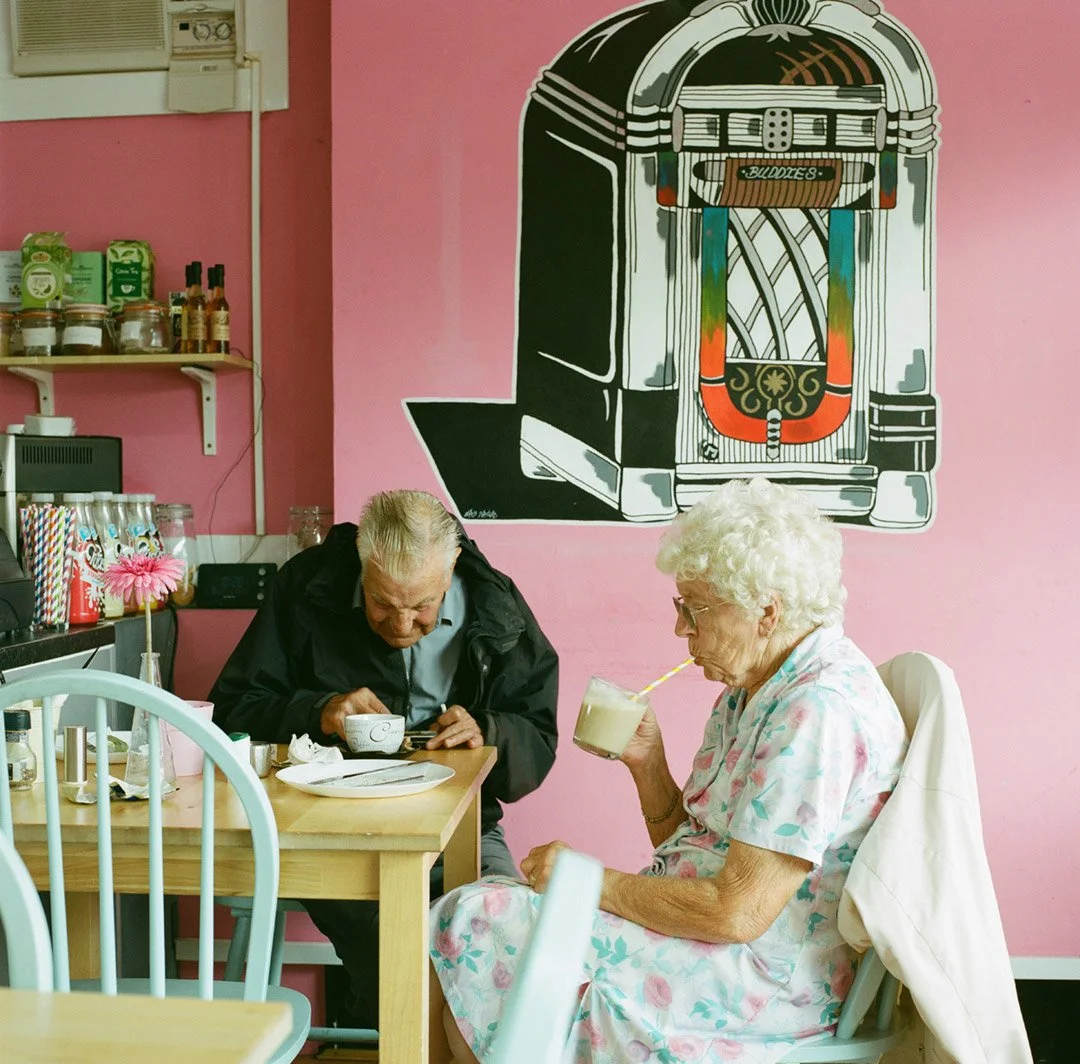 old-man-and-woman-in-vintage-style-cafe.jpg