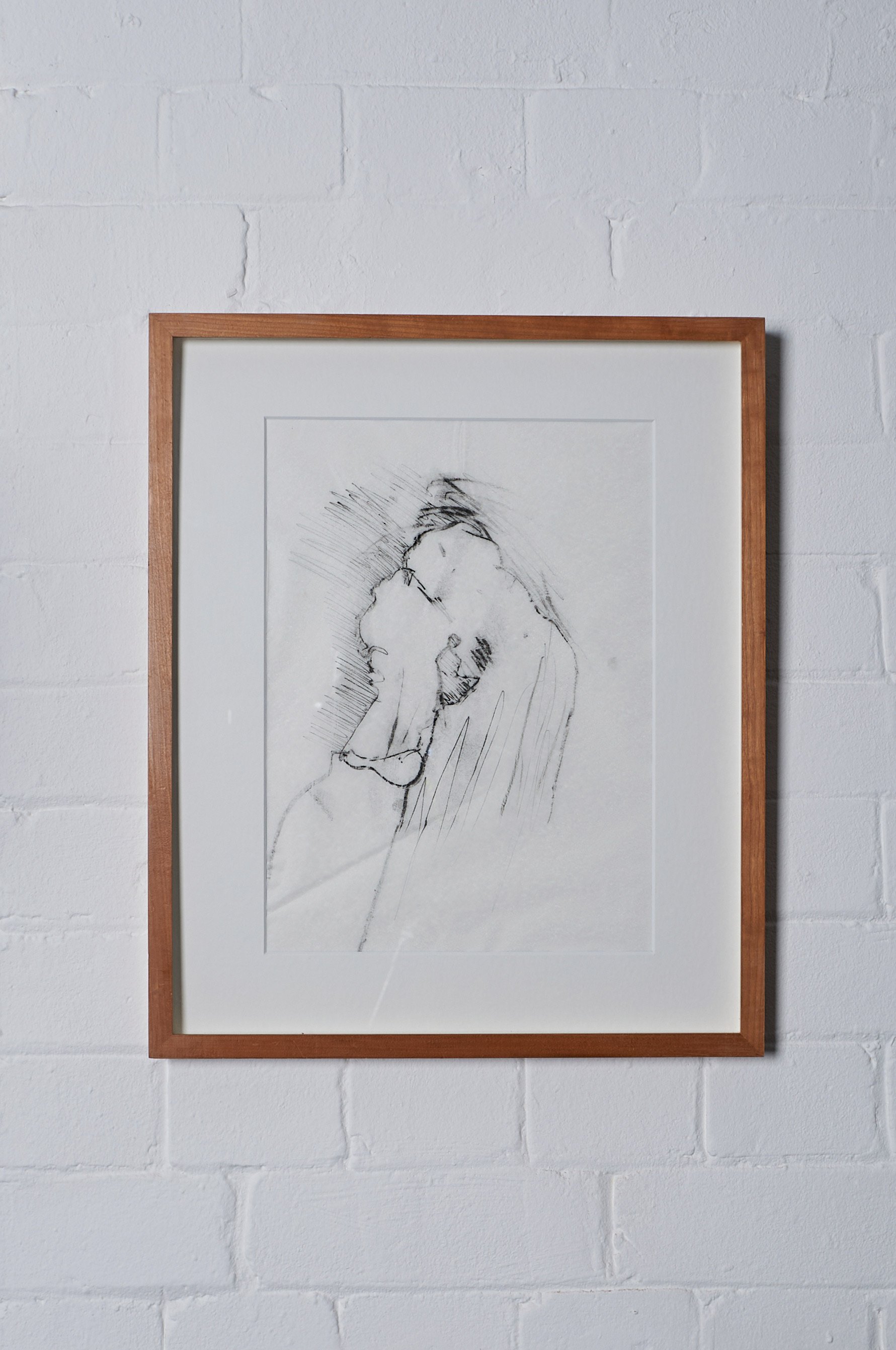 Installation photo of a framed monoprint artwork