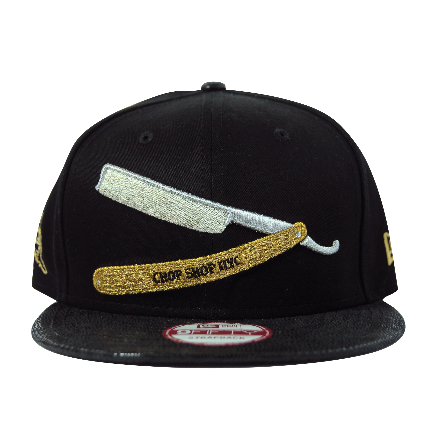 Black baseball cap with embroidered barber scissors and straight razor, and the words 'Chop Shop NYC' on the embroidery.