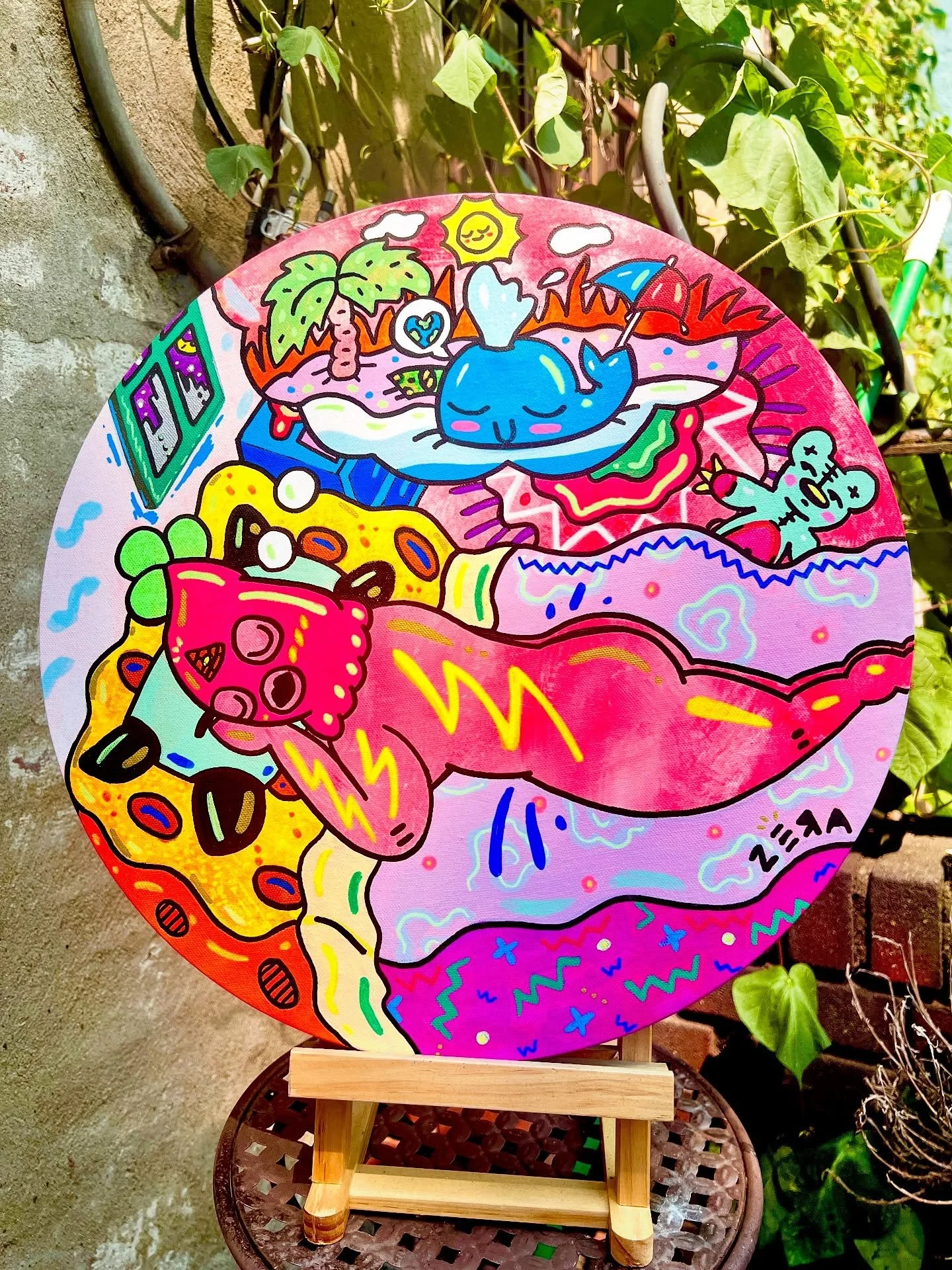 &lsquo;Beach Dream$&rsquo; 🌜🌃🛌💭🌞🌴💕

Latest Skigurl piece - acrylics on 16&rdquo; round canvas in daylight &amp; blacklight 💡; an ode to sand in your toes around the seasonal clock. 👙🩳💦

#skigurl #zera #painting #blacklight #fluorescent