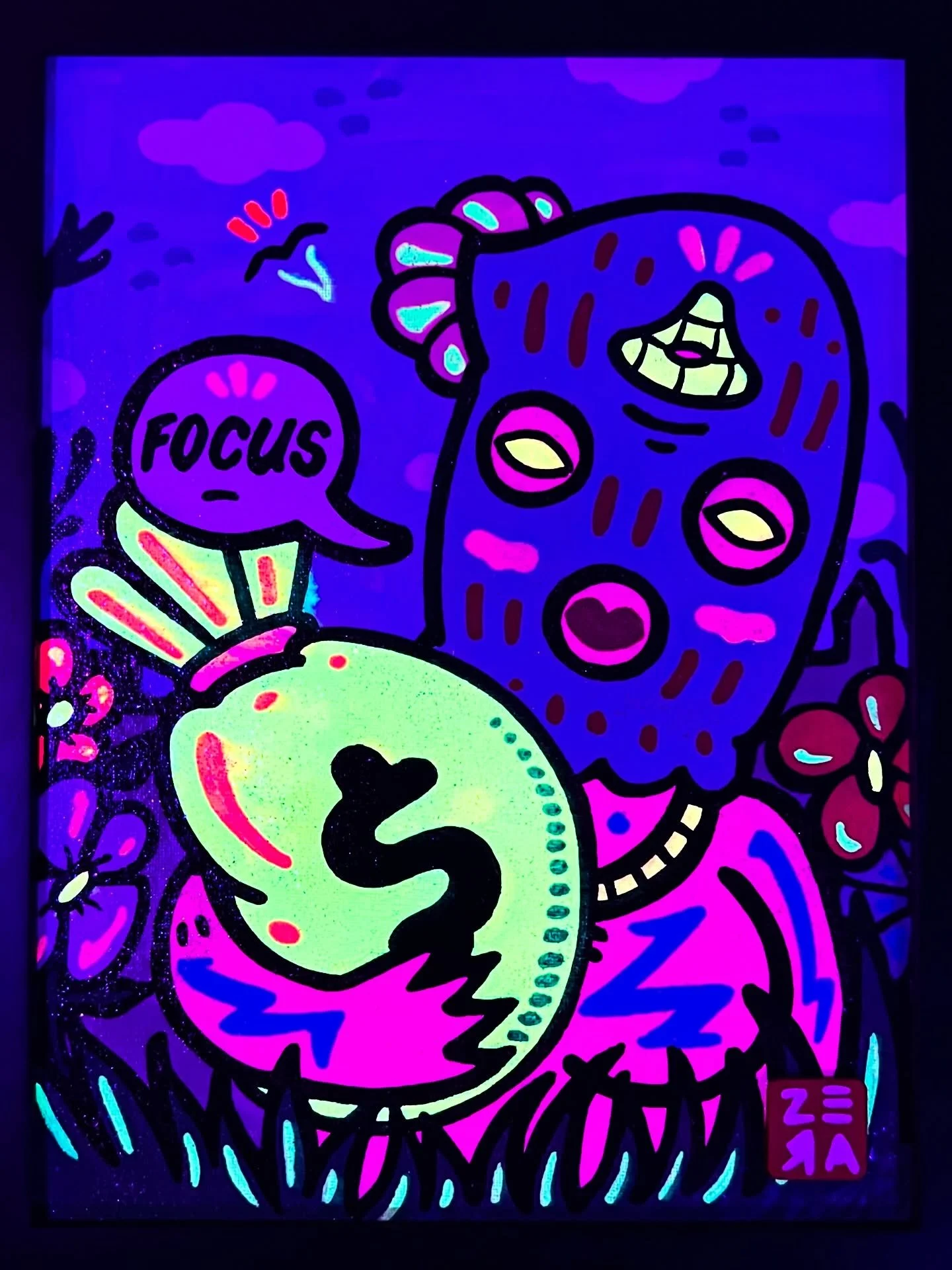 Neon-style drawing of a bear with patchwork facial features, holding a small yellow creature with a black heart, and a speech bubble saying 'FOCUS' against a purple background with clouds and birds.