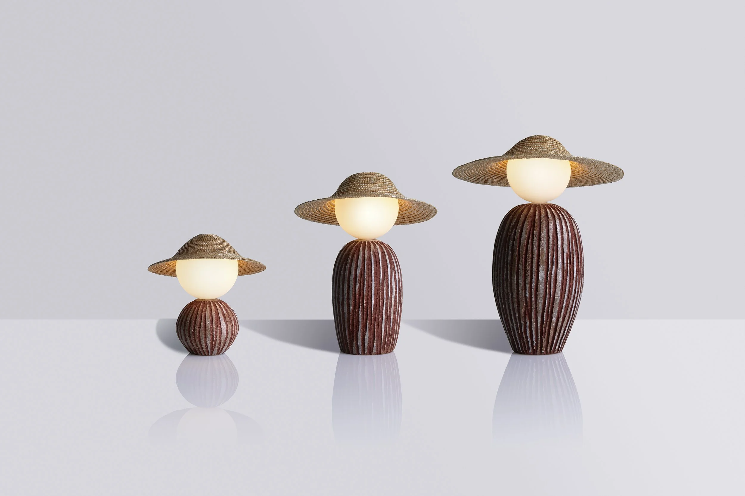  The Théros Ceramic Edition includes three sizes, in a limited edition of 12 each: Small (12x24cm / hat Ø 22cm), Medium (12x36cm / hat Ø 27cm) and Large (40x14cm / hat Ø 32cm).   Credits    Photography: Giorgos Vitsaropoulos     